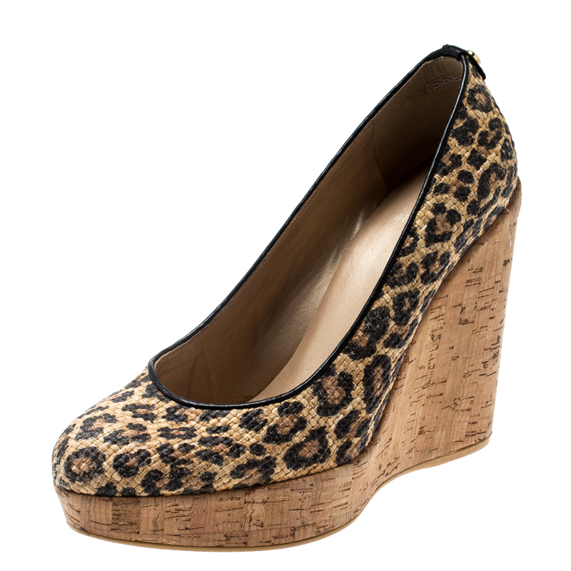 

Stuart Weitzman Beige/Black Leopard Print Raffia Platform Wedge Pumps Size