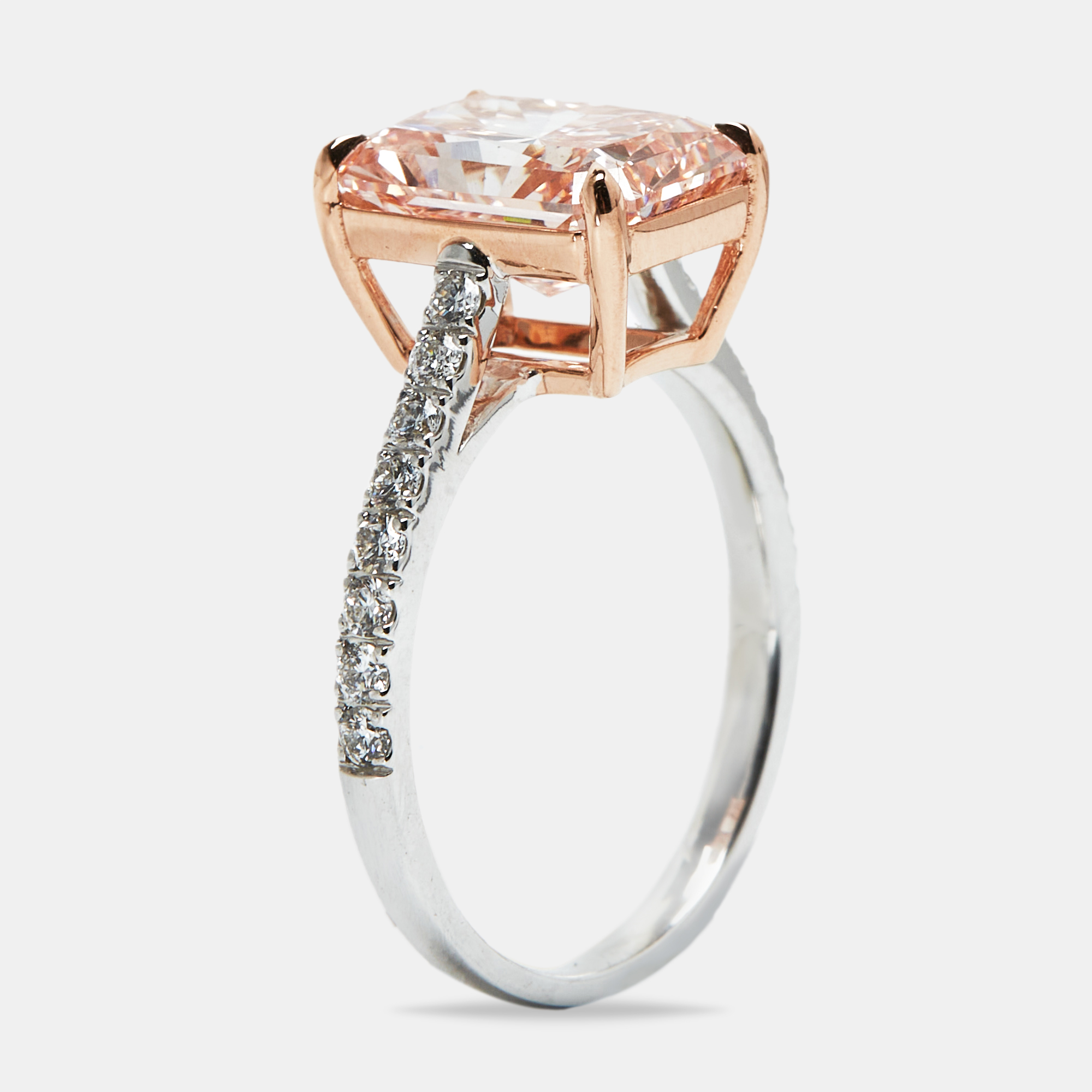 3.40 cts Pink Radiant and Round Lab Grown Diamond 18k Two Tone Gold Ring Size
3.40 cts Pink Radiant and Round Lab Grown Diamond 18k Two Tone Gold Ring Size