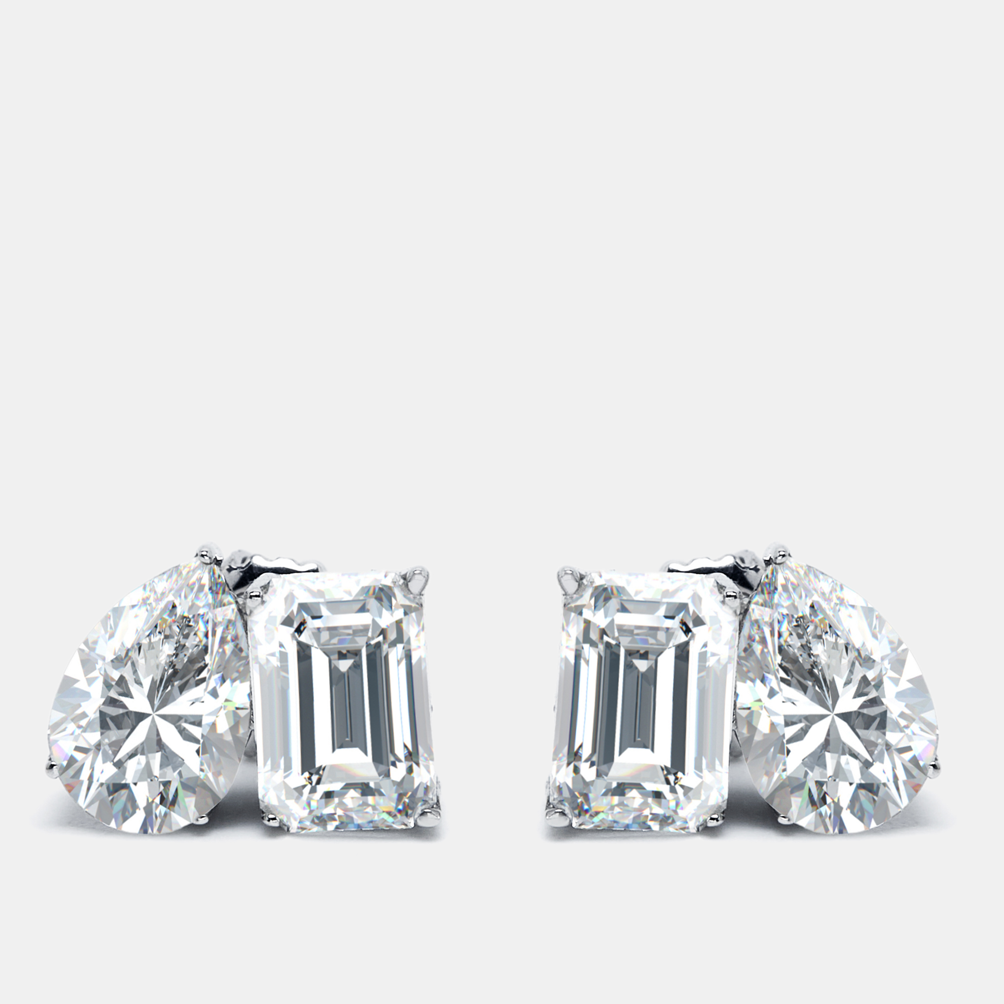 2.00 cts Pear and Emerald Cut Lab Grown Diamonds 18k White Gold Earrings
2.00 cts Pear and Emerald Cut Lab Grown Diamonds 18k White Gold Earrings