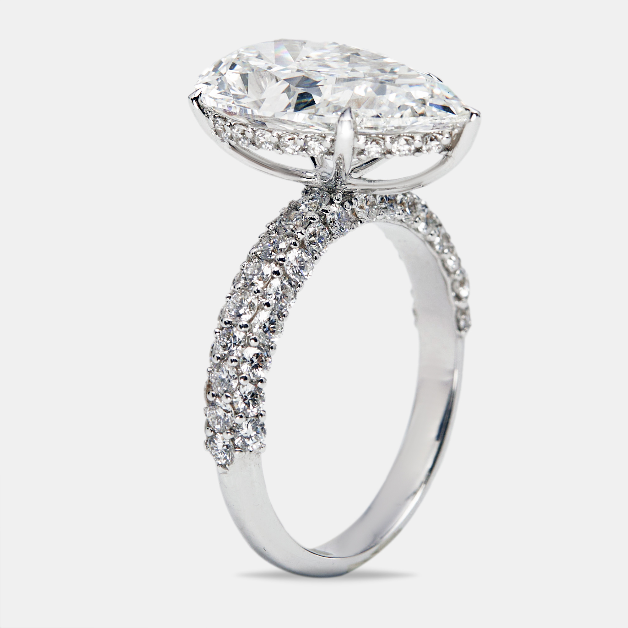 6.25 cts Pear Cut and Round Lab Grown Diamond 18k White Gold Ring Size
6.25 cts Pear Cut and Round Lab Grown Diamond 18k White Gold Ring Size