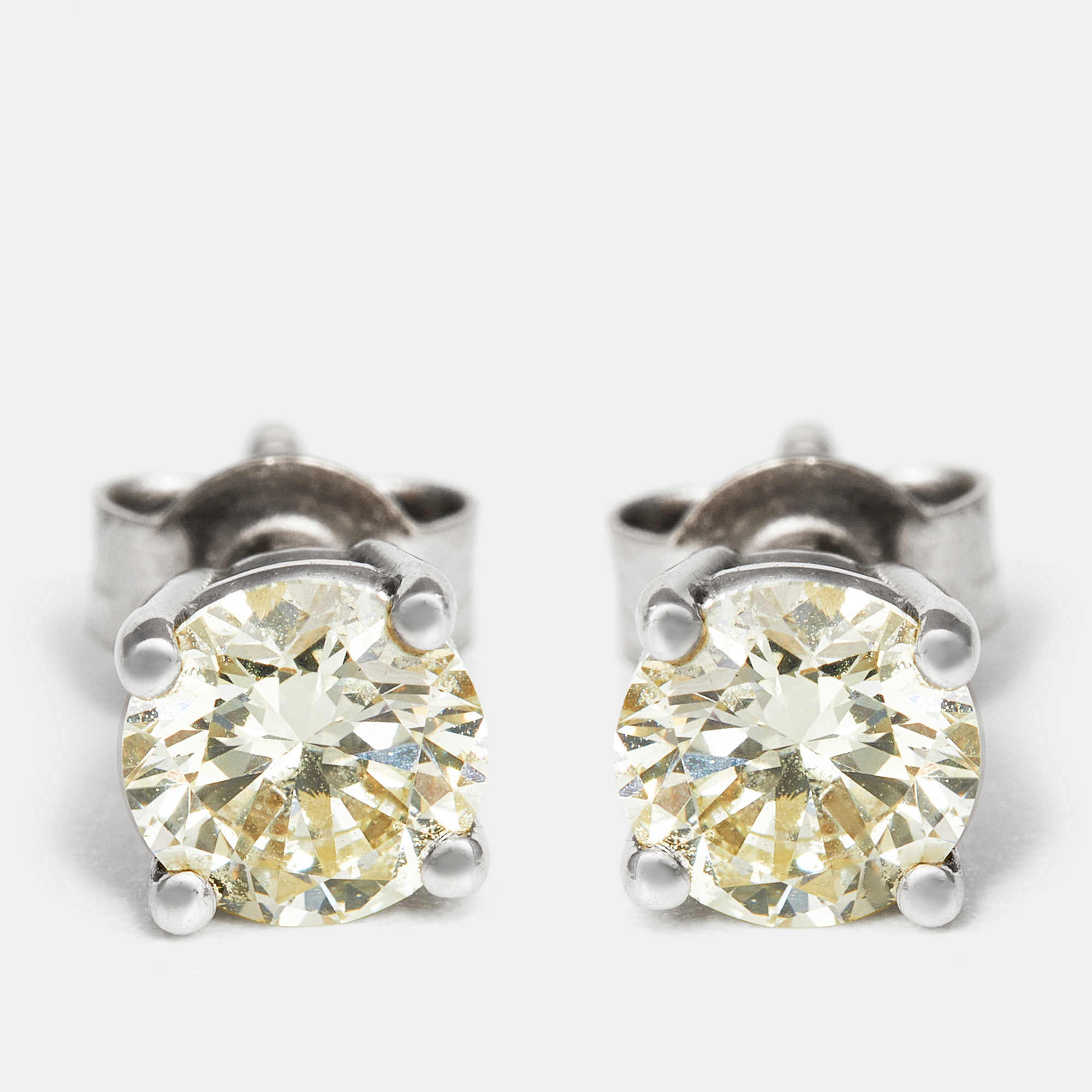 The diamond edit daily wear elegant solitaire diamonds (1.06 ct) 18k white gold stud earrings