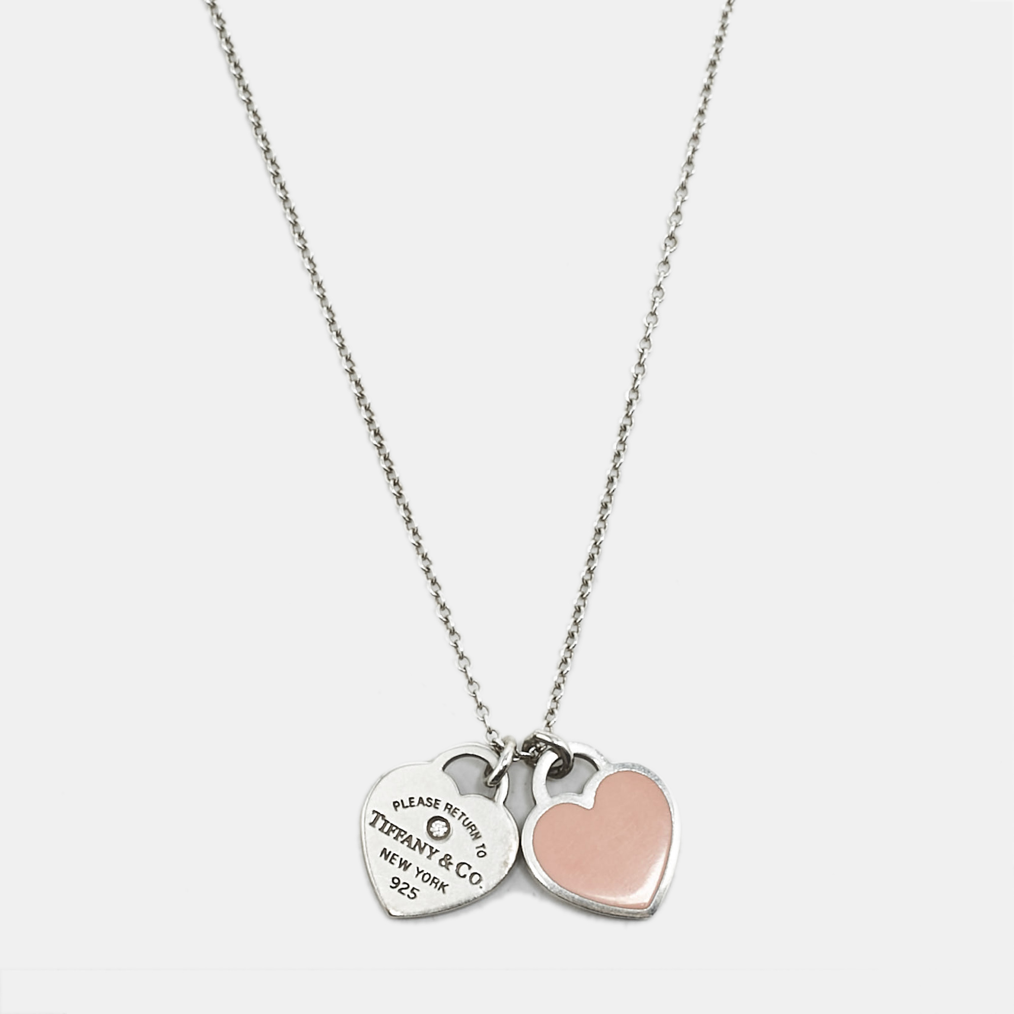 Tiffany & Co. Return to Tiffany® Pink Enamel Diamond Sterling Silver Double Heart Tag Pendant Necklace
Tiffany & Co. Return to Tiffany® Pink Enamel Diamond Sterling Silver Double Heart Tag Pendant Necklace