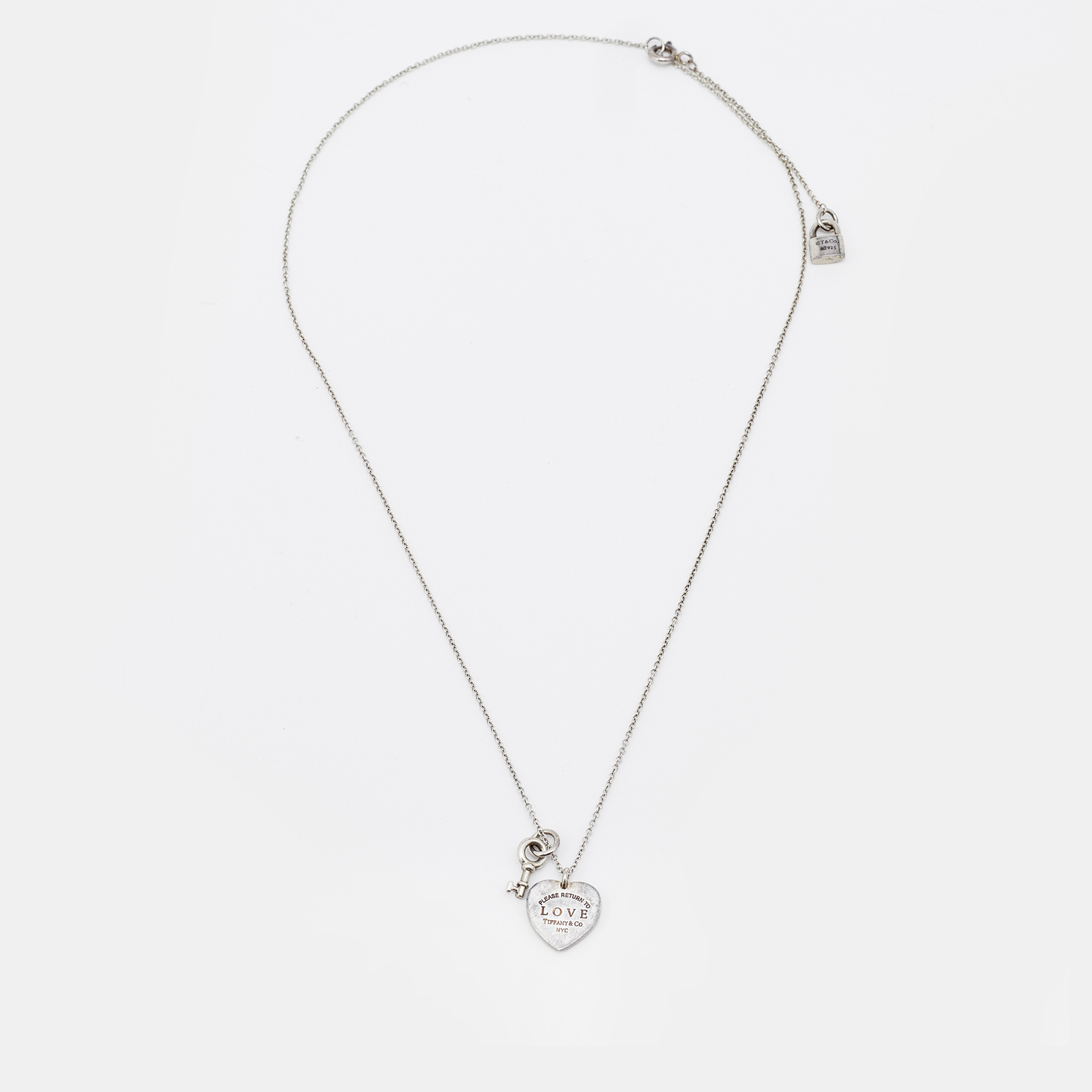 Tiffany & Co. Return to Love Tiffany & Co. Lock Key Charm Heart Tag Sterling Silver Pendant Necklace
Tiffany & Co. Return to Love Tiffany & Co. Lock Key Charm Heart Tag Sterling Silver Pendant Necklace