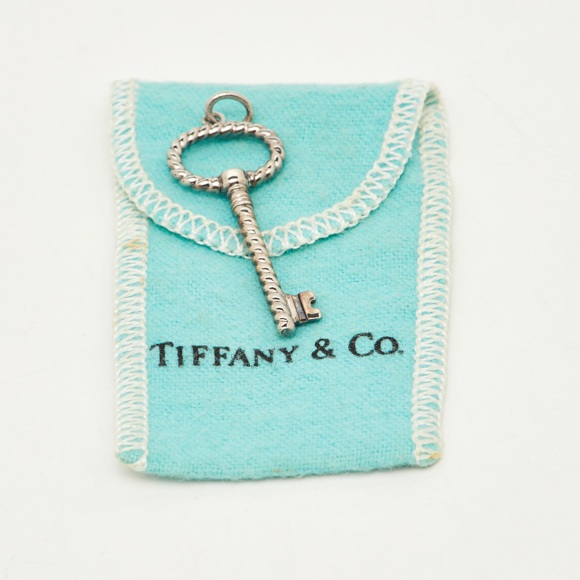Tiffany & Co. T& Co. Twisted Rope Silver Key Pendant
