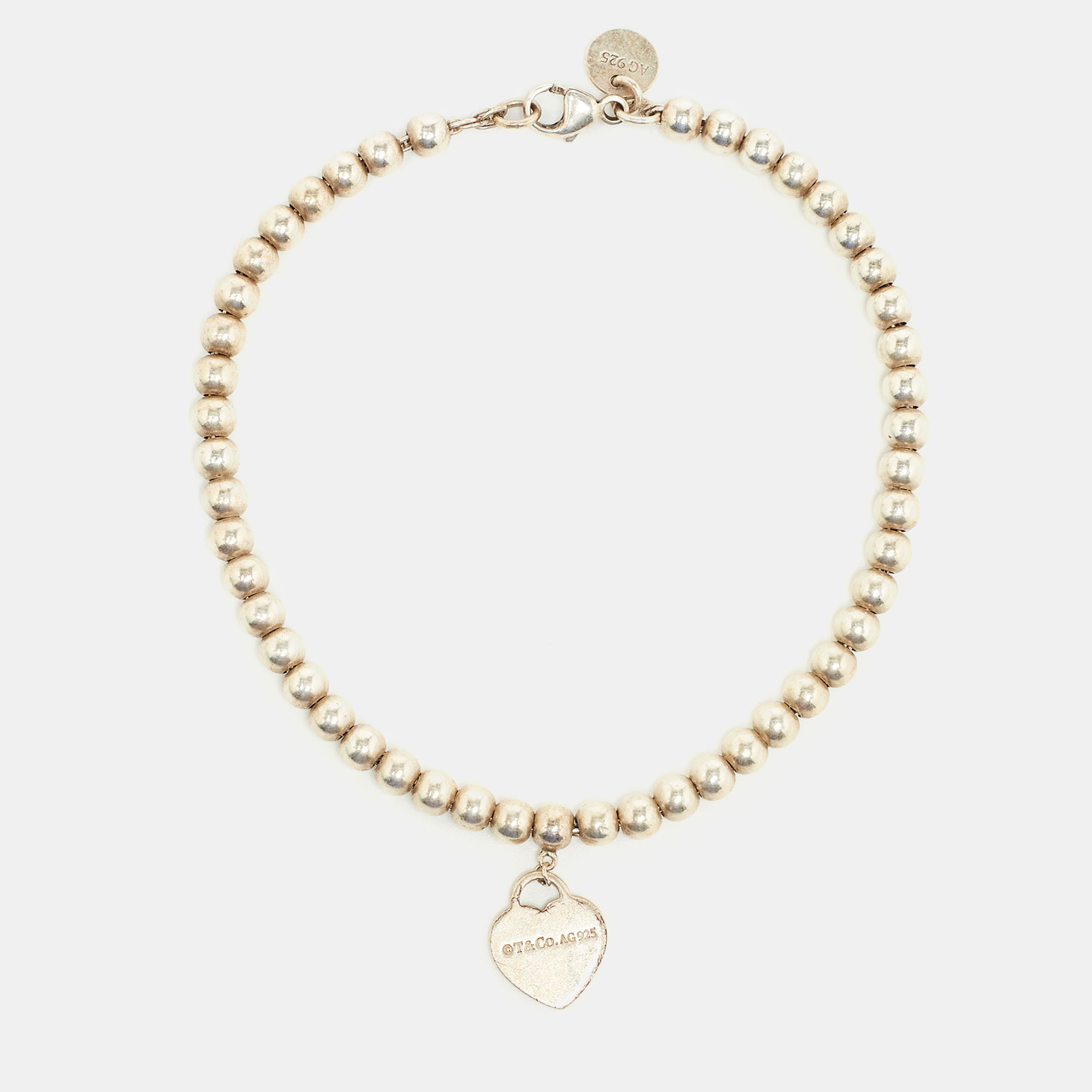 Tiffany & Co. Return to Tiffany Heart Charm Sterling Silver Beaded Bracelet
Tiffany & Co. Return to Tiffany Heart Charm Sterling Silver Beaded Bracelet
