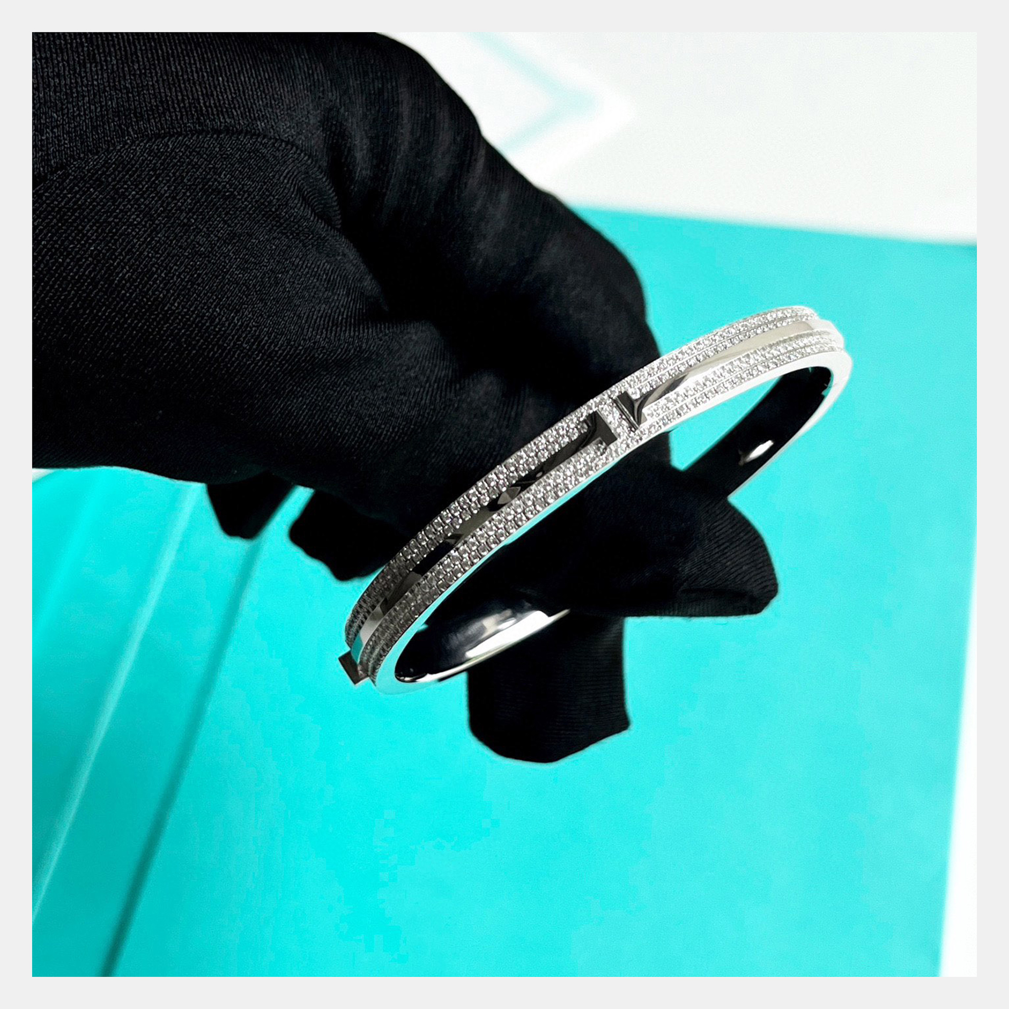 Tiffany & Co. 18K White Gold Half Pave Diamond T Wire Bracelet
Tiffany & Co. 18K White Gold Half Pave Diamond T Wire Bracelet