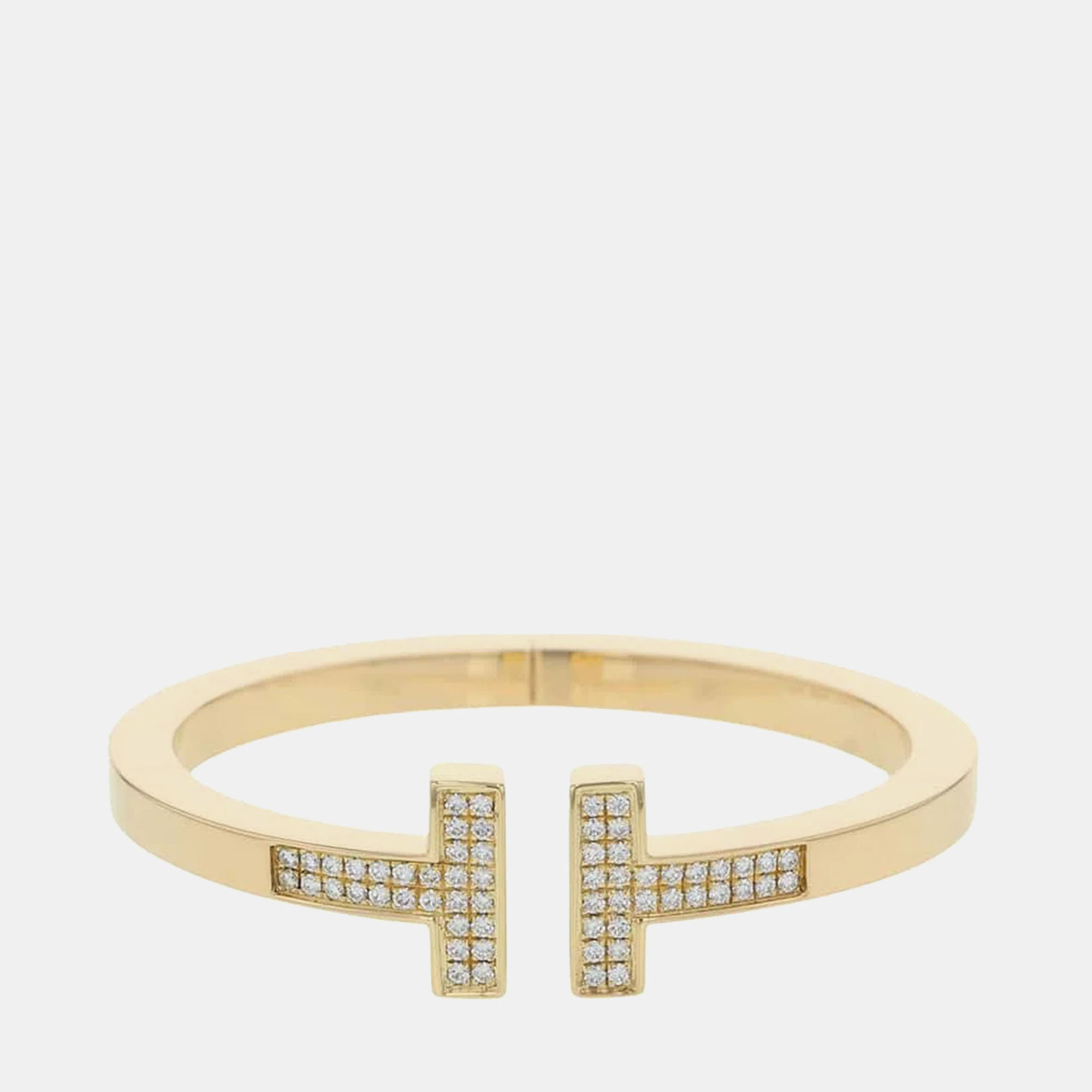 Tiffany & Co. 18K Yellow Gold and Diamond T Square Wrap Bracelet
Tiffany & Co. 18K Yellow Gold and Diamond T Square Wrap Bracelet
