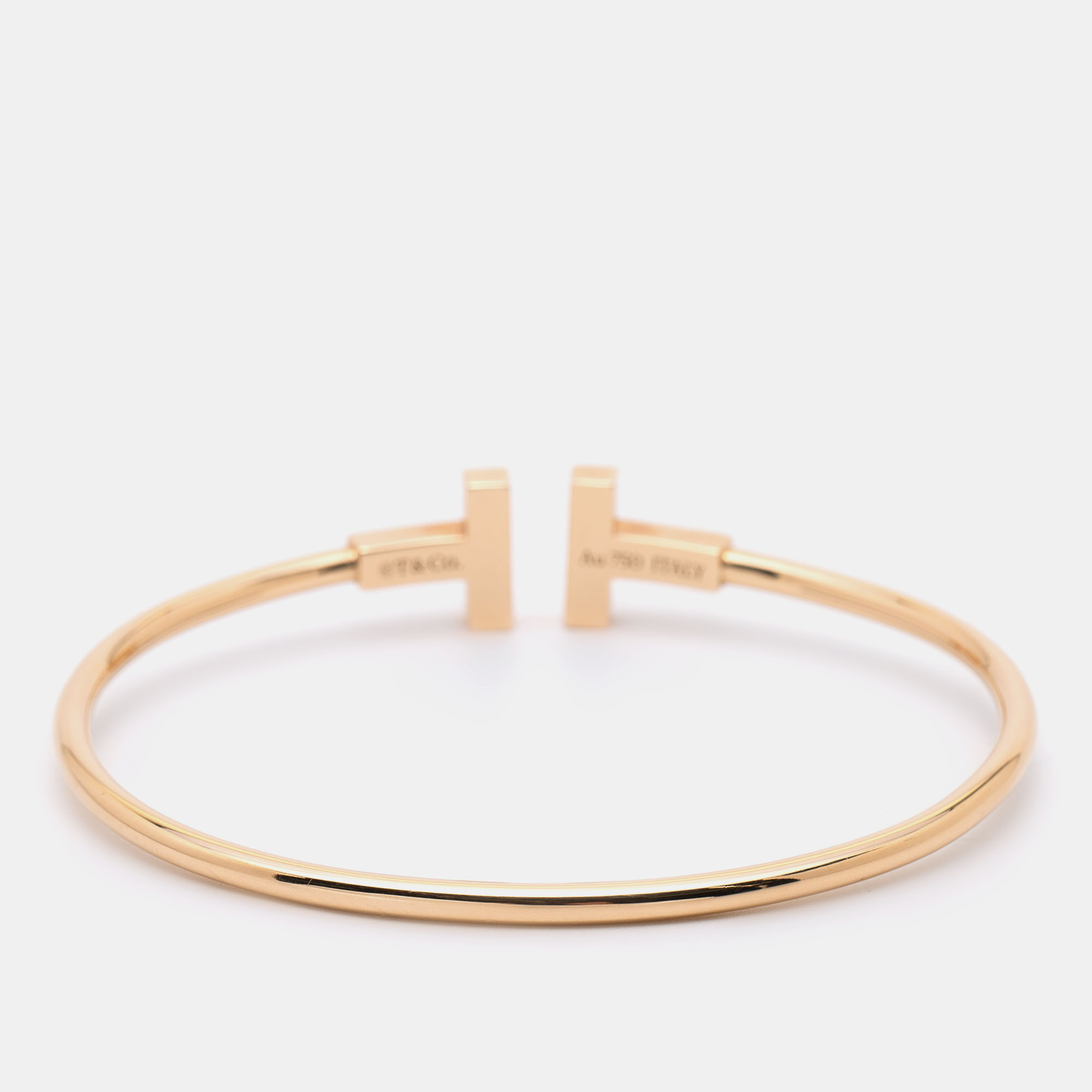 Tiffany & Co. Tiffany T Wire Diamond Mother of Pearl 18k Rose Gold Bracelet
Tiffany & Co. Tiffany T Wire Diamond Mother of Pearl 18k Rose Gold Bracelet
