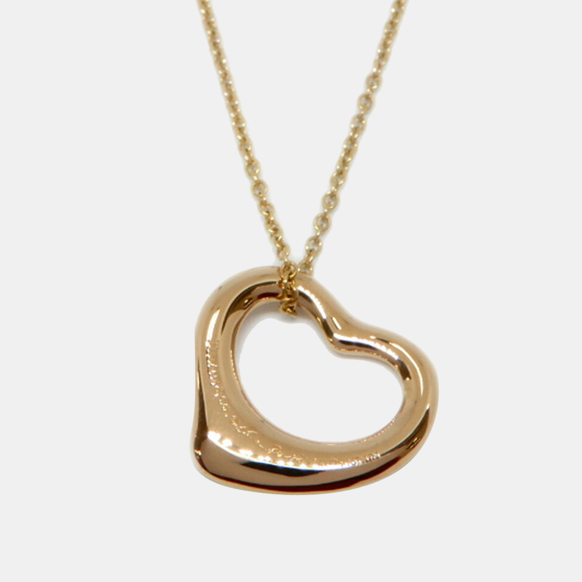 Tiffany & Co. 18K Rose Gold and Diamonds Elsa Peretti Open Heart Pendant Necklace
Tiffany & Co. 18K Rose Gold and Diamonds Elsa Peretti Open Heart Pendant Necklace