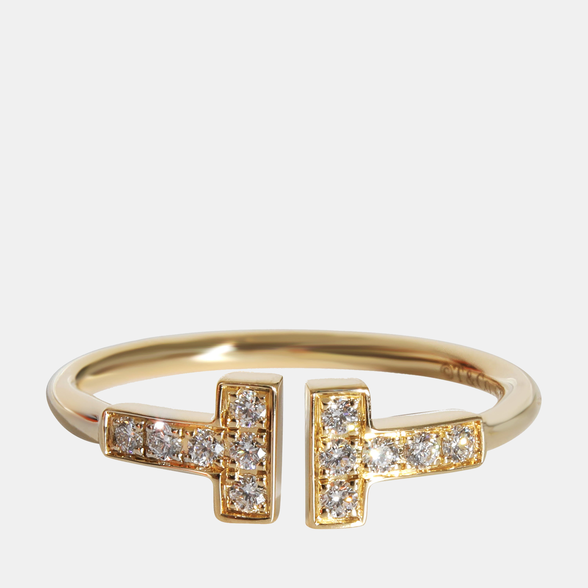 Tiffany & Co. Tiffany T Diamond Wire Ring in 18k Yellow Gold 0.13 CTW Ring US 6.25
Tiffany & Co. Tiffany T Diamond Wire Ring in 18k Yellow Gold 0.13 CTW Ring US 6.25