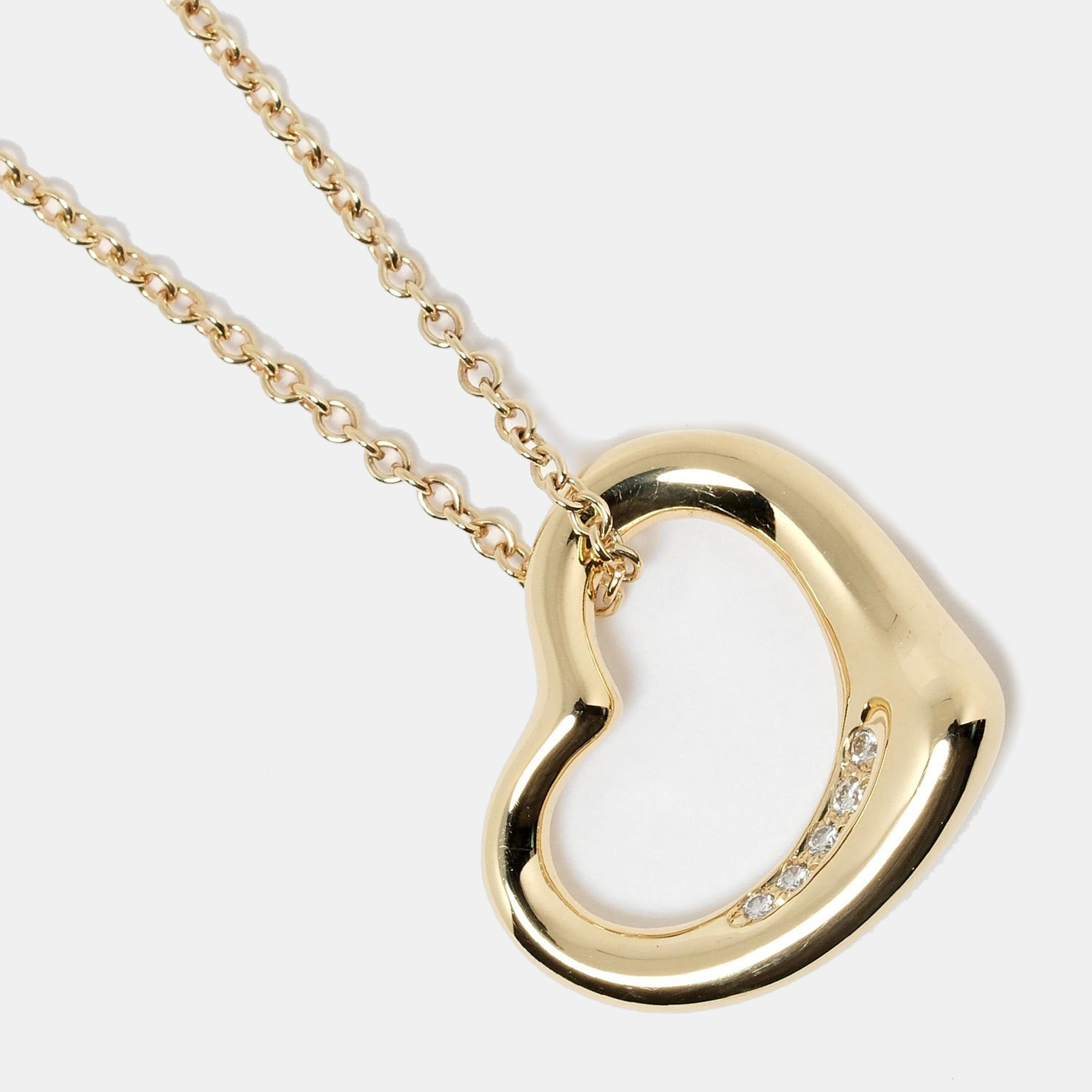 Tiffany & Co. Elsa Peretti Open Heart 18K Yellow Gold Diamond Necklace
Tiffany & Co. Elsa Peretti Open Heart 18K Yellow Gold Diamond Necklace