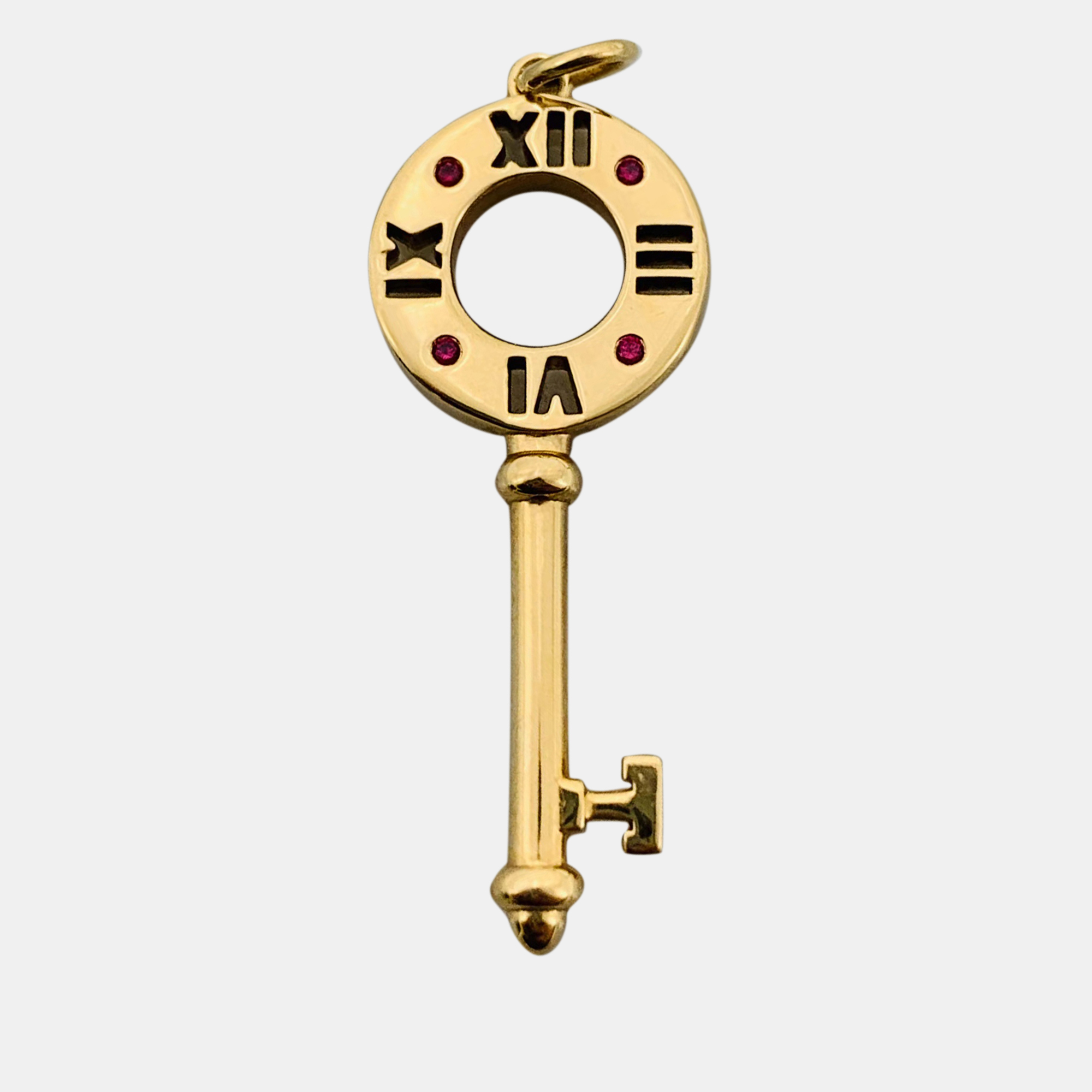 Tiffany & co. 18k yellow gold and ruby atlas pierced key pendant