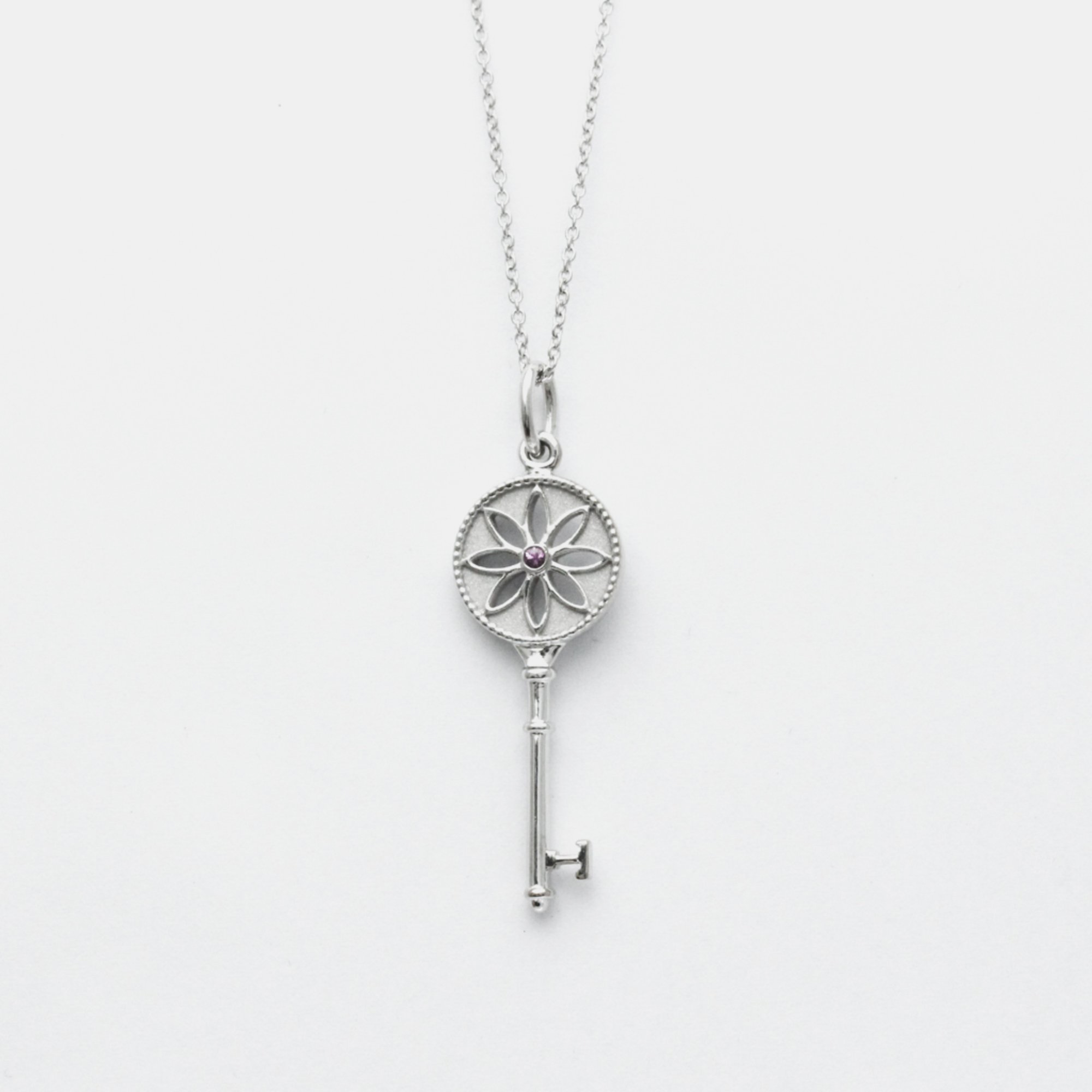 Tiffany & co. 18k white gold and sapphire daisy key pendant necklace