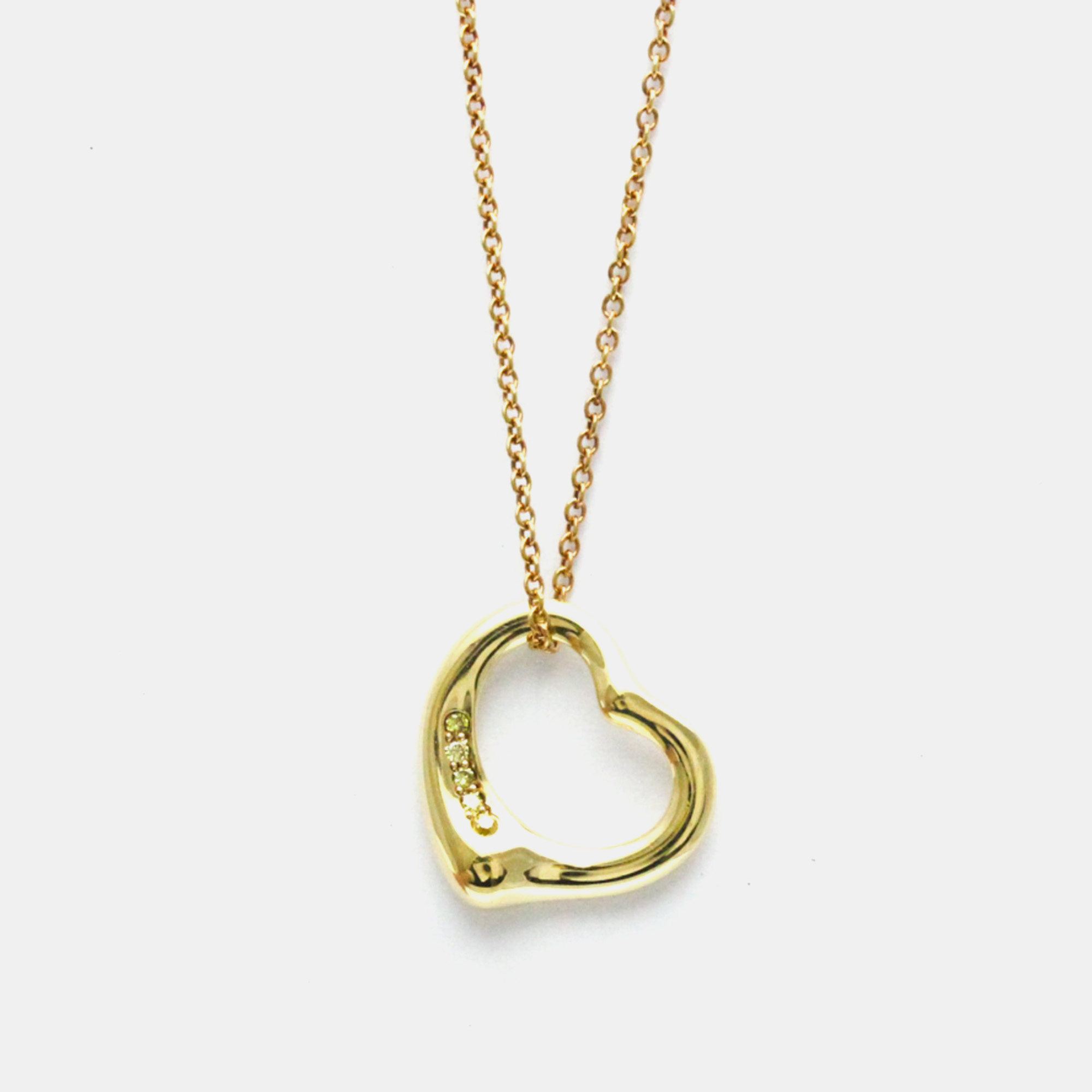 Tiffany & co. 18k yellow gold and diamond elsa peretti open heart pendant necklace