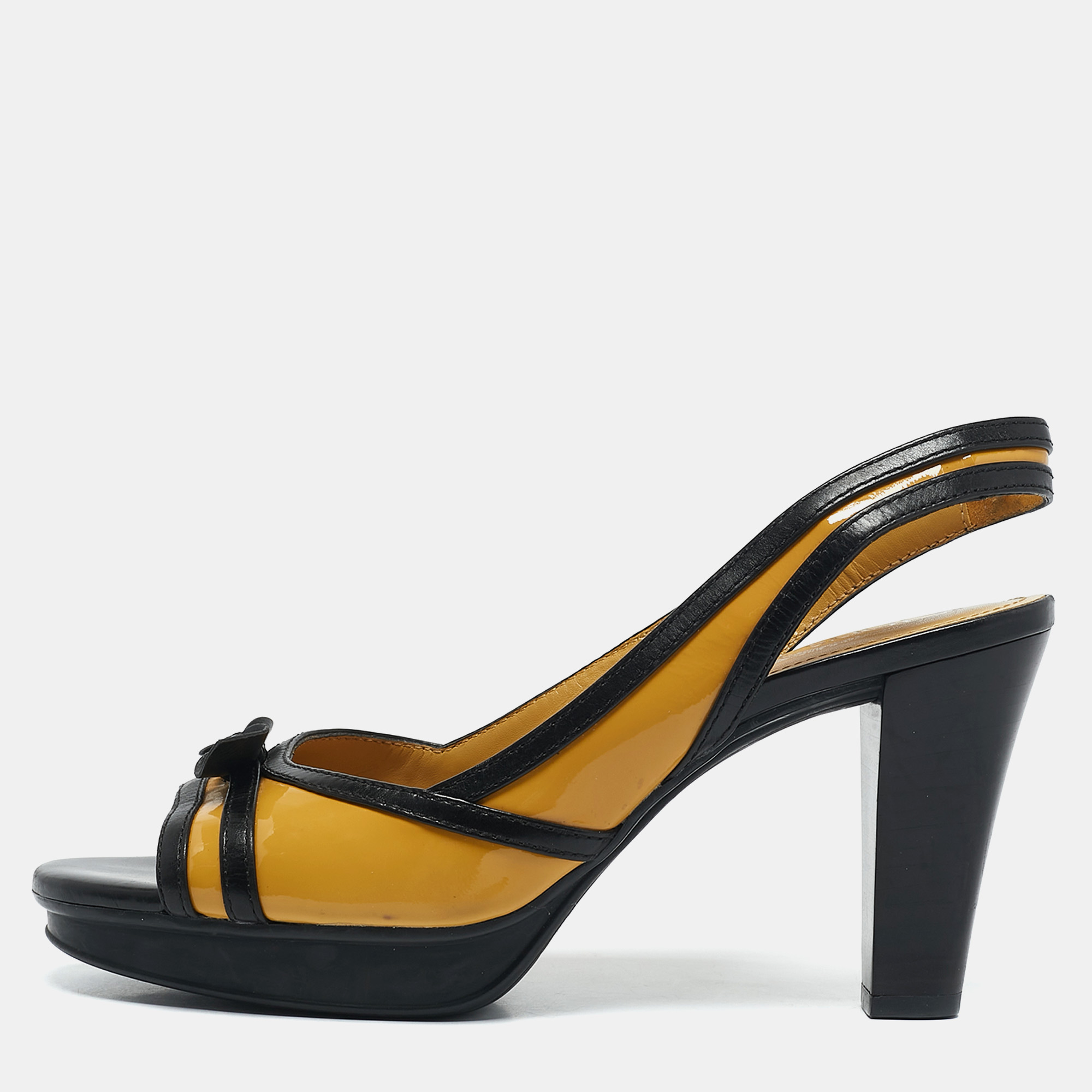 Tod's YellowBlack Patent and Leather Platform Slingback Sandals Size, Yellow
Tod's YellowBlack Patent and Leather Platform Slingback Sandals Size, Yellow