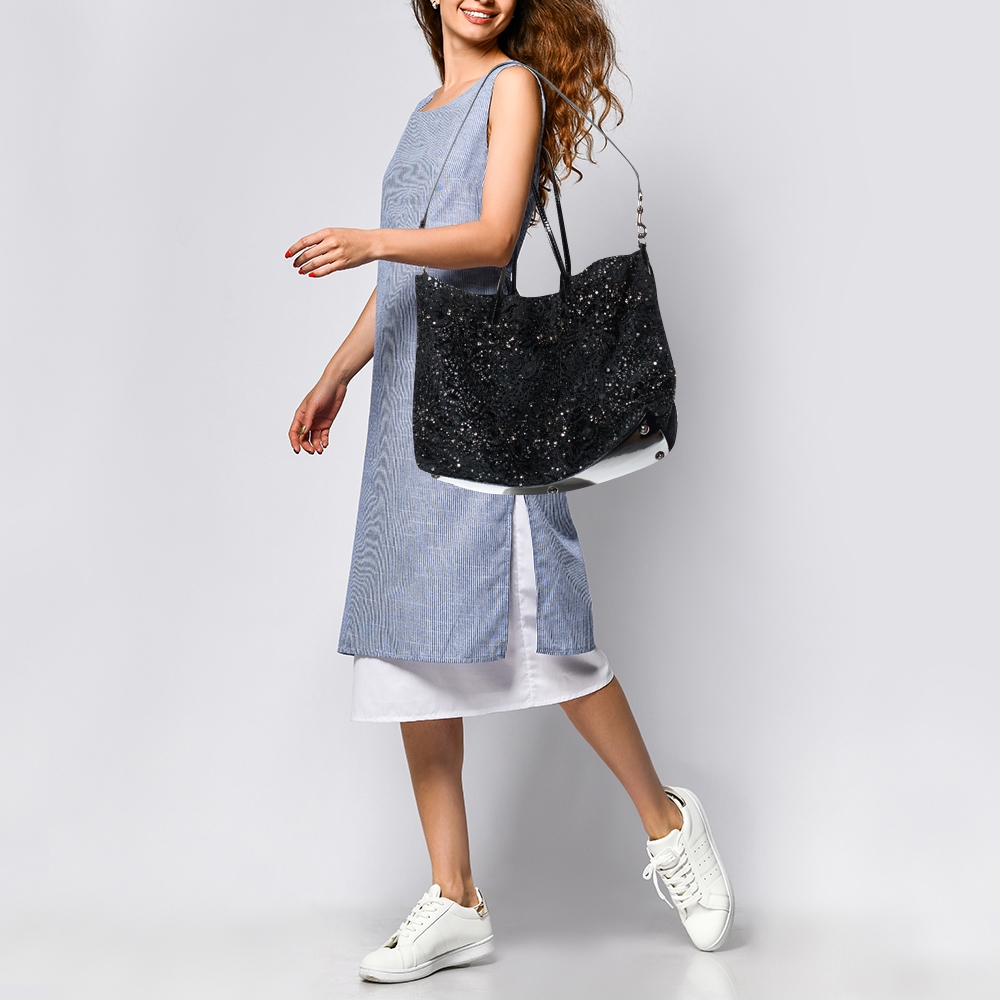 Valentino Black Laser Cut Calfhair and Patent Leather Crystal Embellished Tote
Valentino Black Laser Cut Calfhair and Patent Leather Crystal Embellished Tote