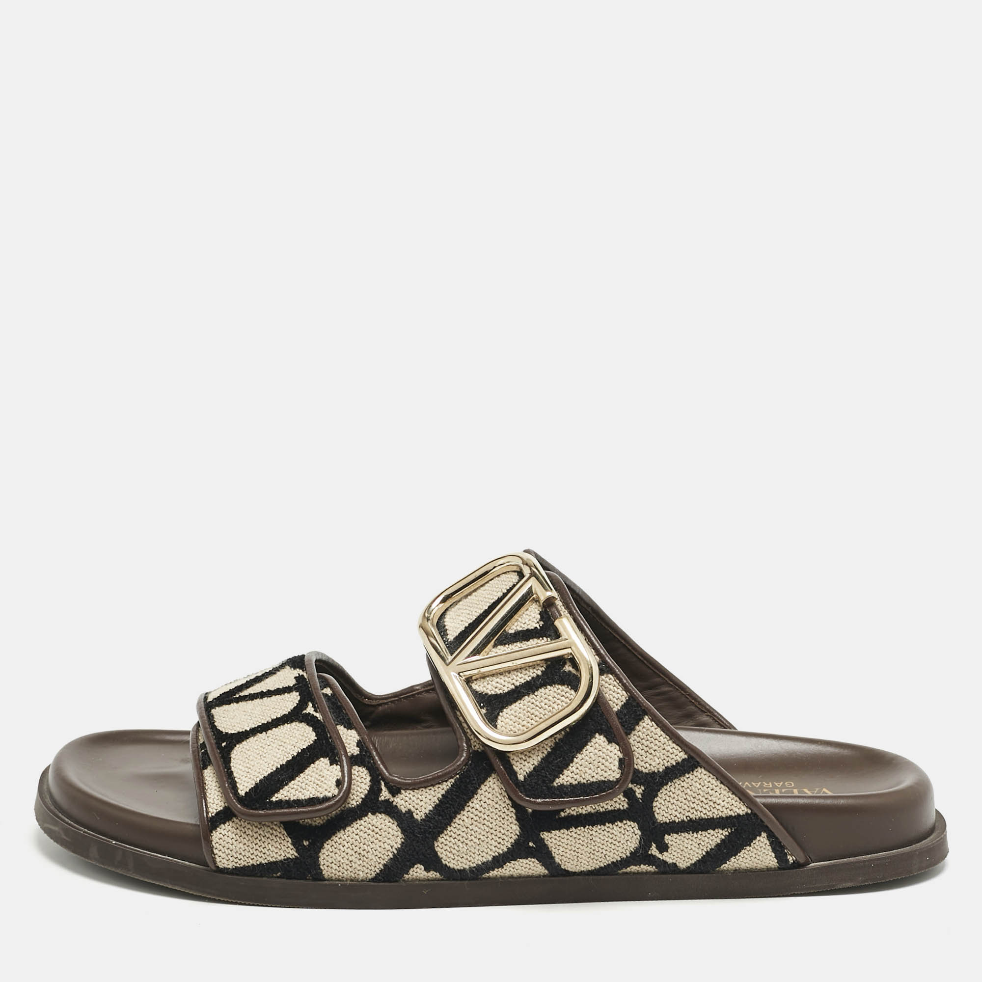 Valentino Brown/Cream Canvas and Fabric Logo Slide Sandals Size 40
Valentino Brown/Cream Canvas and Fabric Logo Slide Sandals Size 40