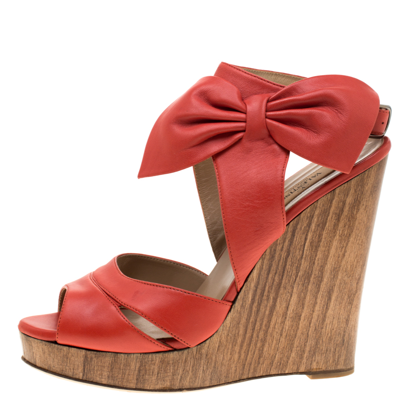 Valentino Coral Red Leather Bow Detail Ankle Strap Wedge Platform Sandals Size
Valentino Coral Red Leather Bow Detail Ankle Strap Wedge Platform Sandals Size