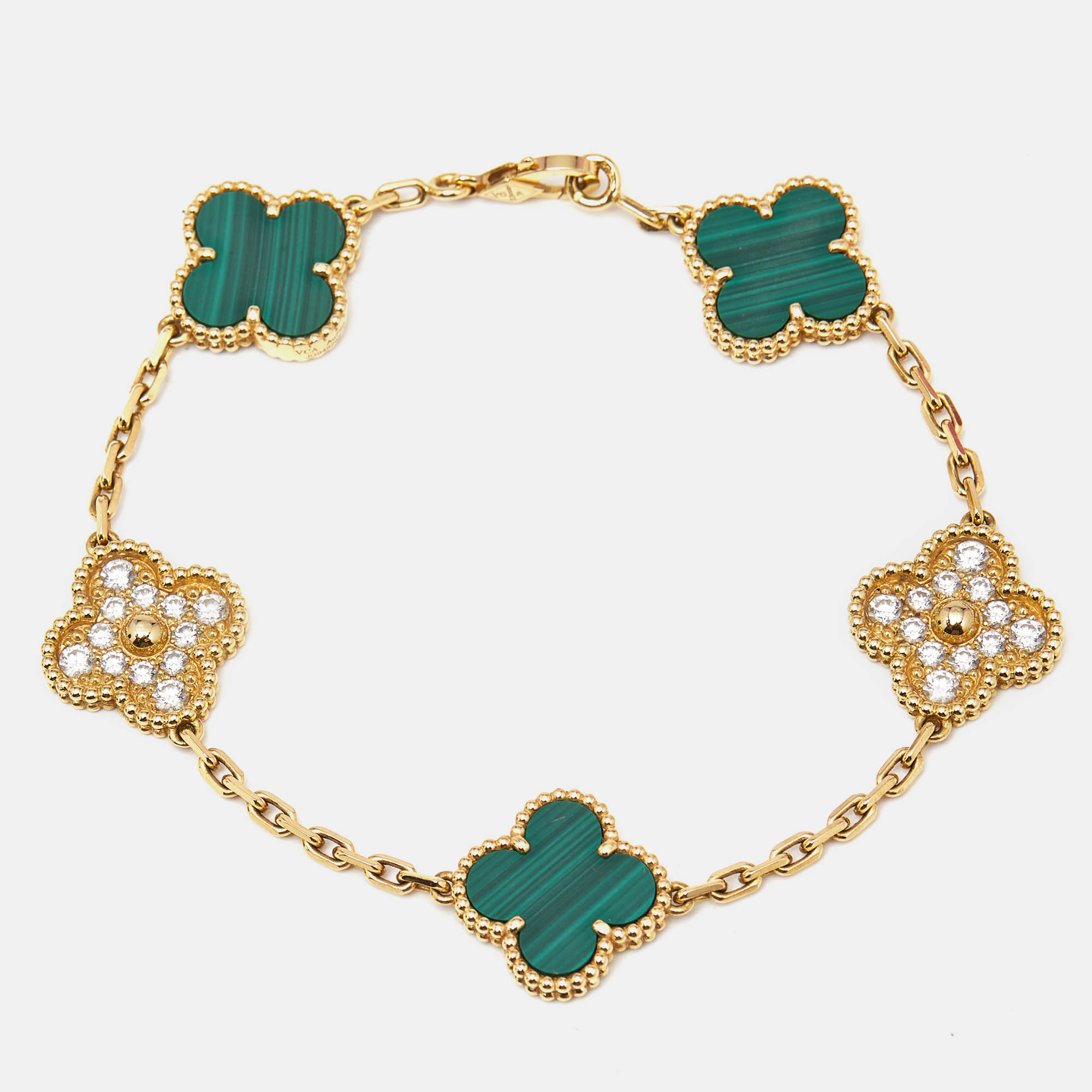 Van Cleef & Arpels Vintage Alhambra Malachite Diamond 18k Yellow Gold 5 Motif Station Bracelet
Van Cleef & Arpels Vintage Alhambra Malachite Diamond 18k Yellow Gold 5 Motif Station Bracelet