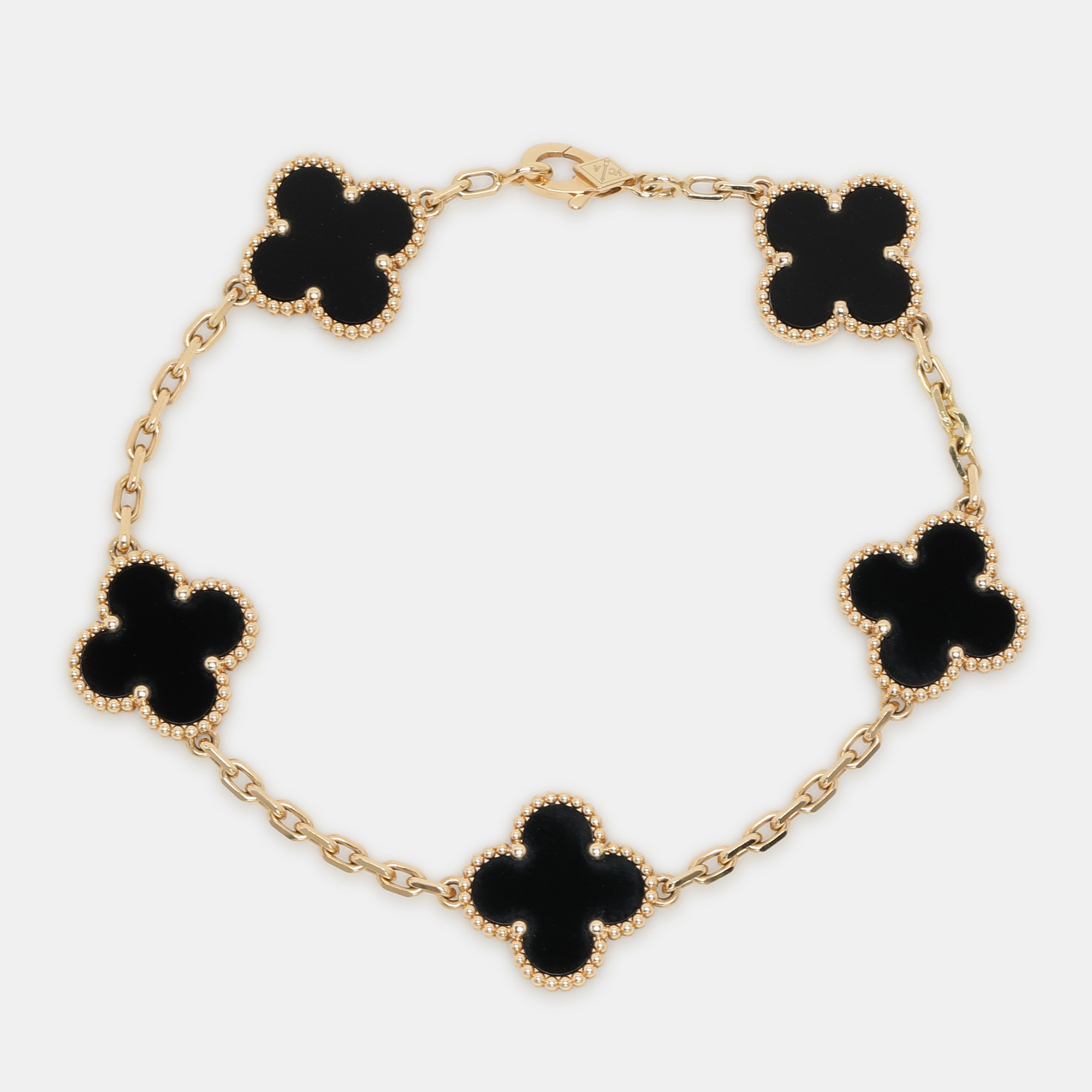 Van Cleef & Arpels Vintage Alhambra Onyx 5 Motif 18K Yellow Gold Bracelet
Van Cleef & Arpels Vintage Alhambra Onyx 5 Motif 18K Yellow Gold Bracelet