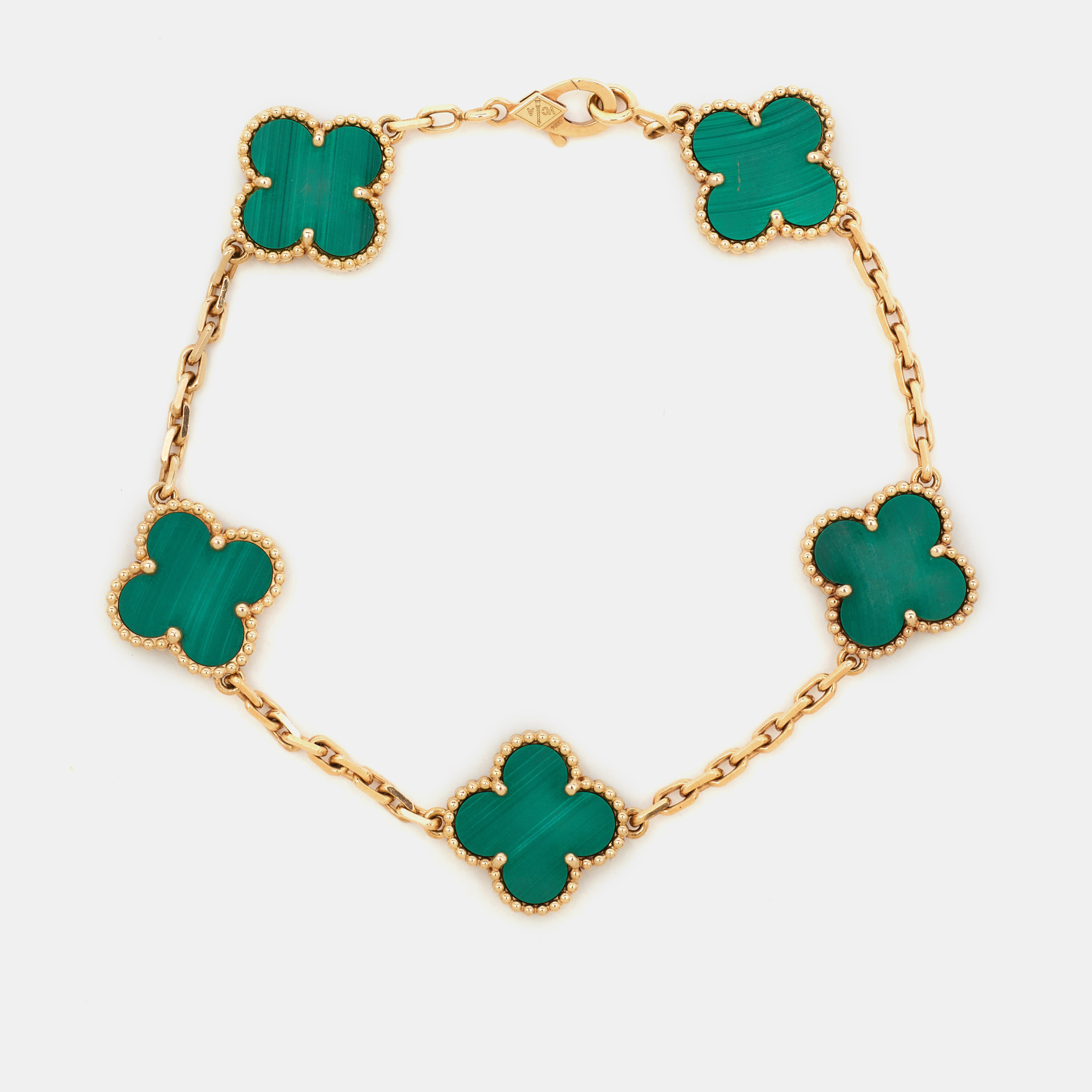 Van Cleef & Arpels Vintage Alhambra Malachite 18k Yellow Gold 5 Motif Bracelet
Van Cleef & Arpels Vintage Alhambra Malachite 18k Yellow Gold 5 Motif Bracelet