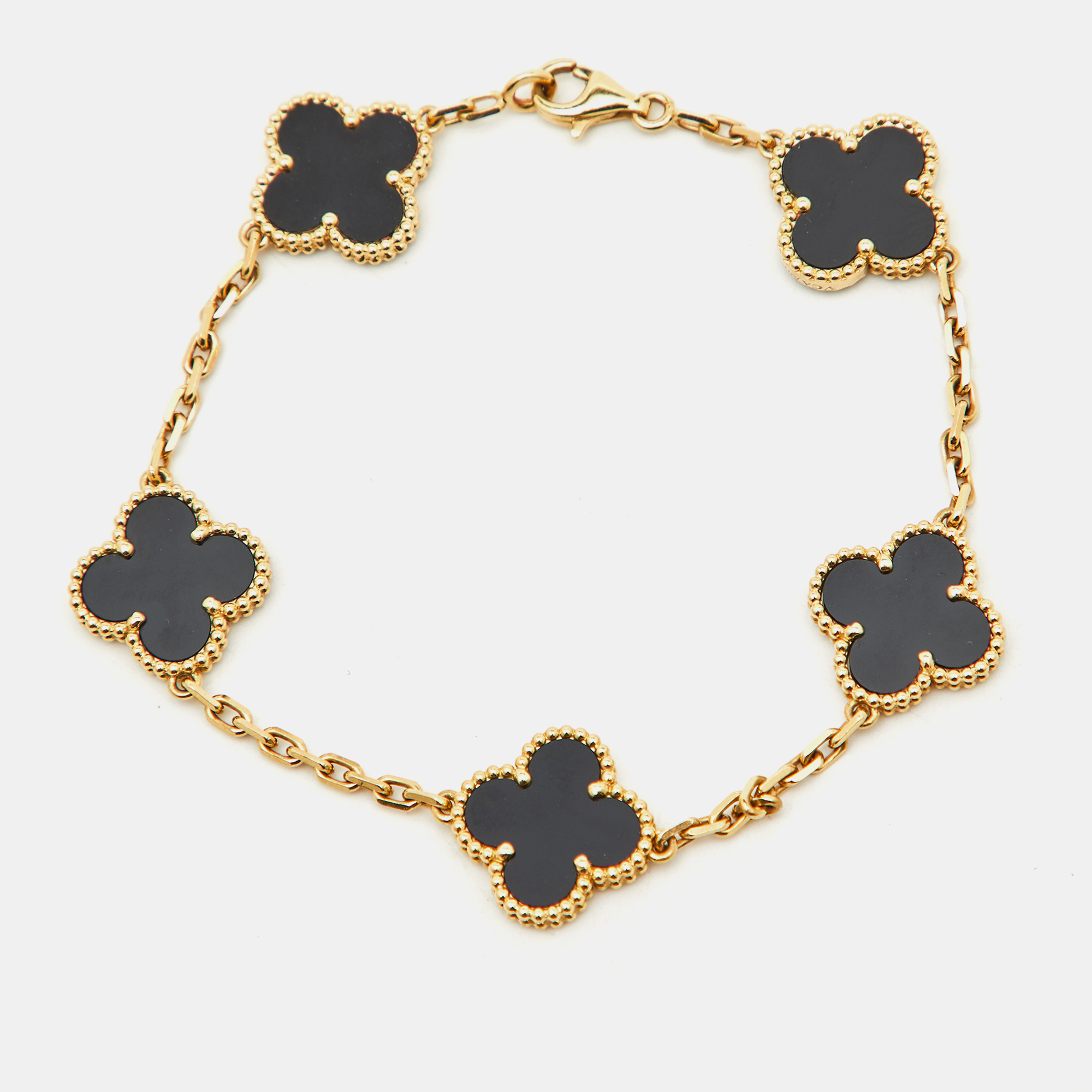 Van Cleef & Arpels Vintage Alhambra Onyx 18k Yellow Gold 5 Motif Station Bracelet
Van Cleef & Arpels Vintage Alhambra Onyx 18k Yellow Gold 5 Motif Station Bracelet