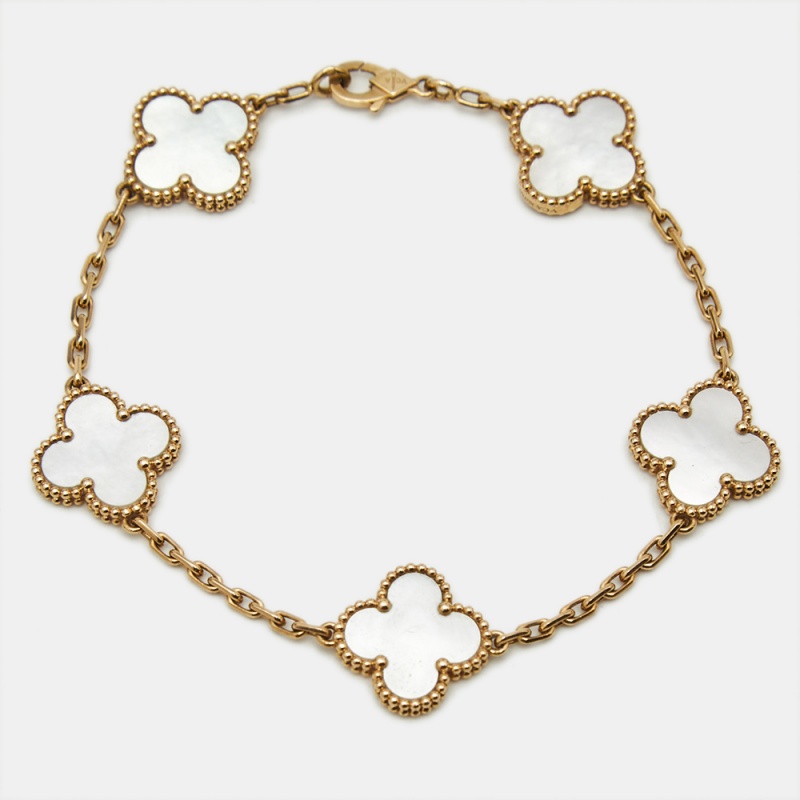 Van Cleef & Arpels Vintage Alhambra Mother of Pearl 18k Yellow Gold 5 Motif Station Bracelet
Van Cleef & Arpels Vintage Alhambra Mother of Pearl 18k Yellow Gold 5 Motif Station Bracelet