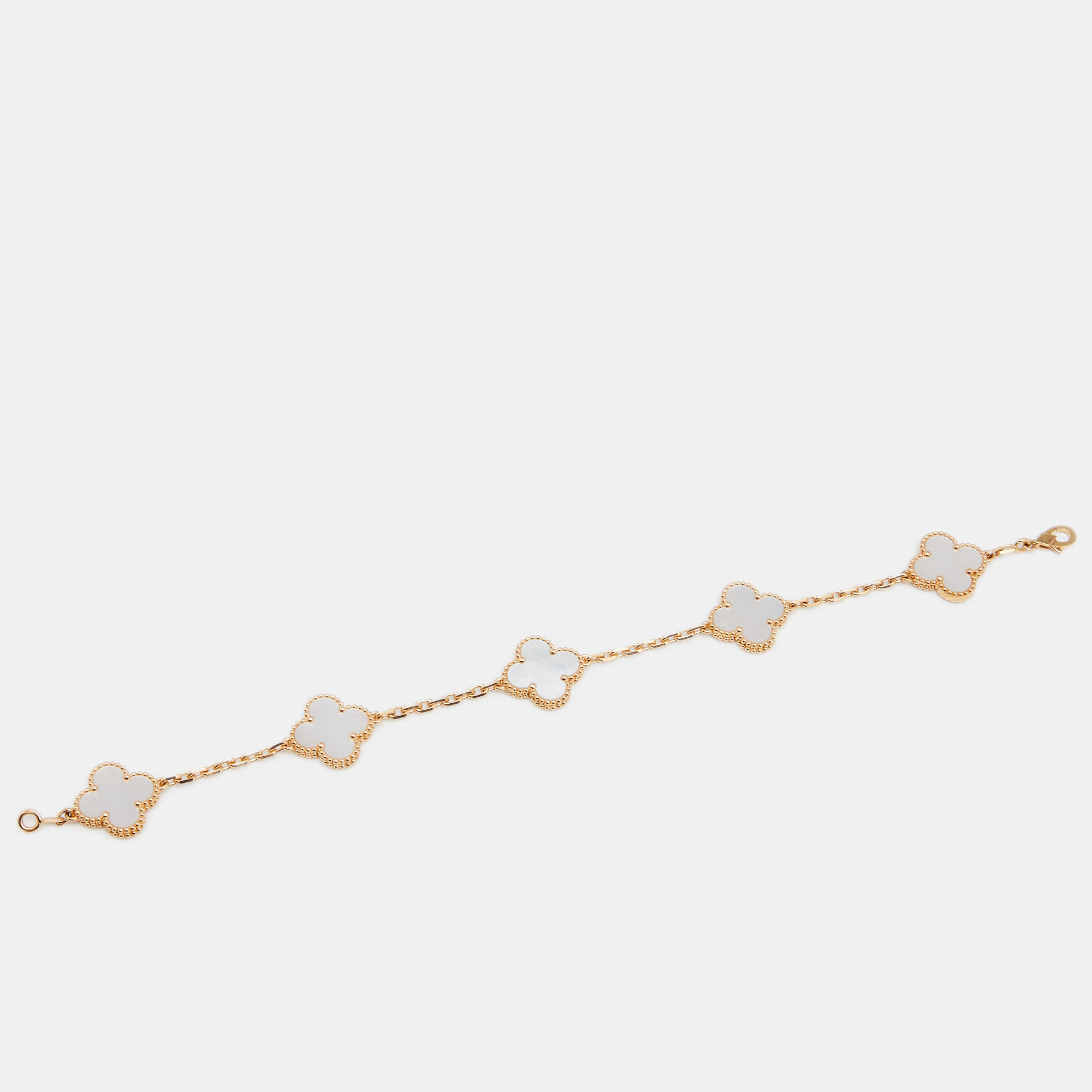 Van Cleef & Arpels Vintage Alhambra Mother of Pearl 18K Yellow Gold 5 Motif Bracelet
Van Cleef & Arpels Vintage Alhambra Mother of Pearl 18K Yellow Gold 5 Motif Bracelet