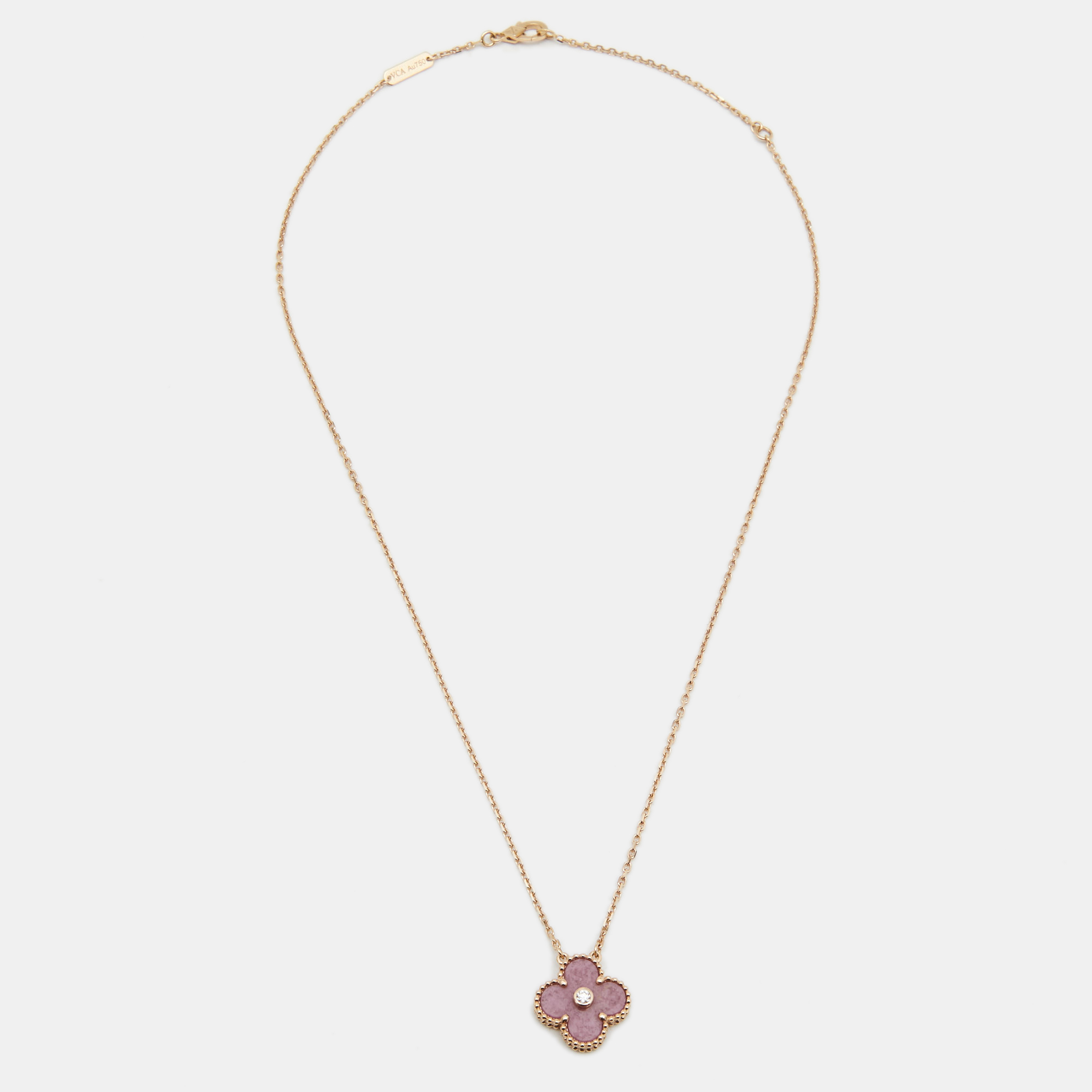 Van Cleef & Arpels Vintage Alhambra Rhodonite Diamond 18k Rose Gold Pendnat Necklace
Van Cleef & Arpels Vintage Alhambra Rhodonite Diamond 18k Rose Gold Pendnat Necklace