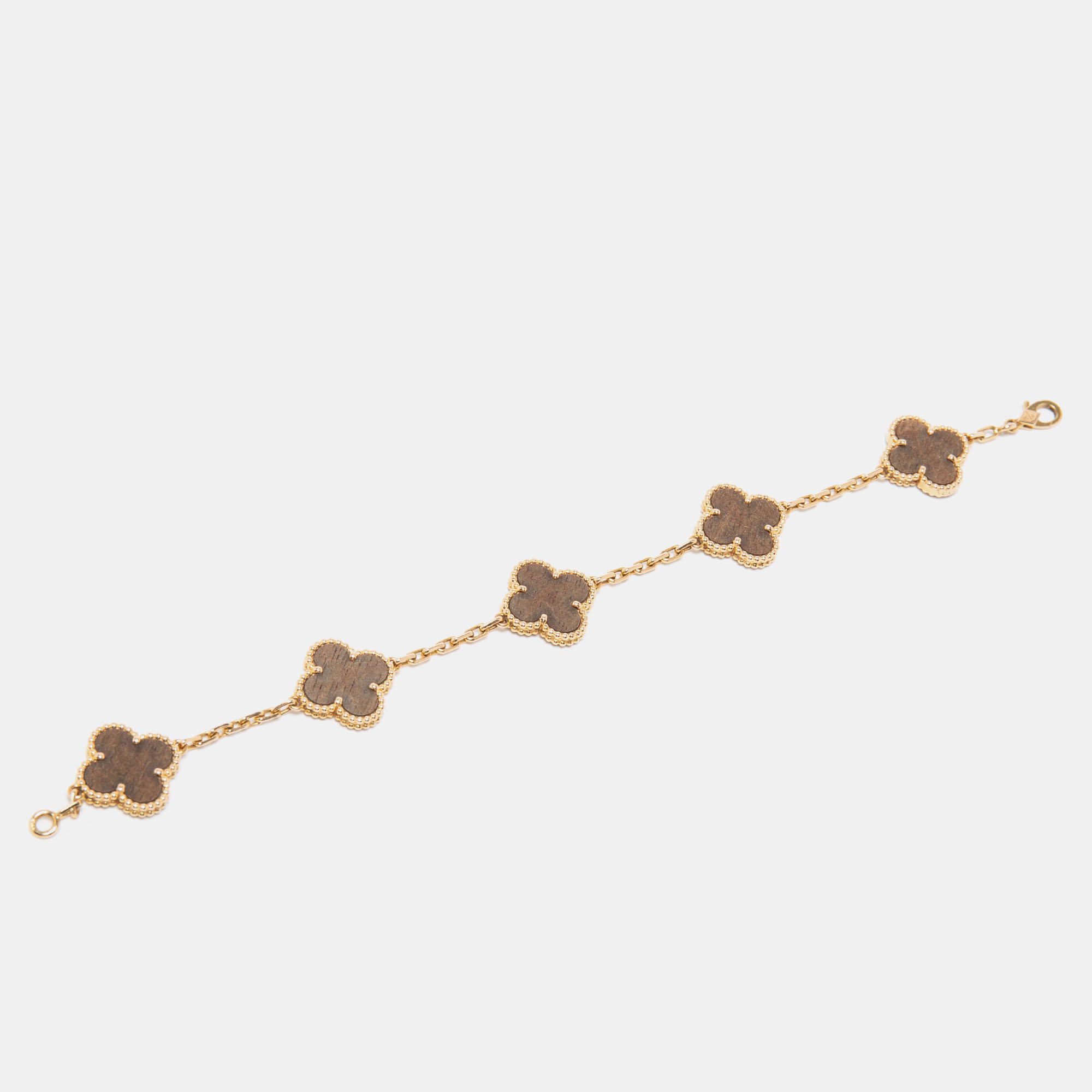 Van Cleef & Arpels Vintage Alhambra 5 Motif Wood 18k Rose Gold Station Bracelet
Van Cleef & Arpels Vintage Alhambra 5 Motif Wood 18k Rose Gold Station Bracelet