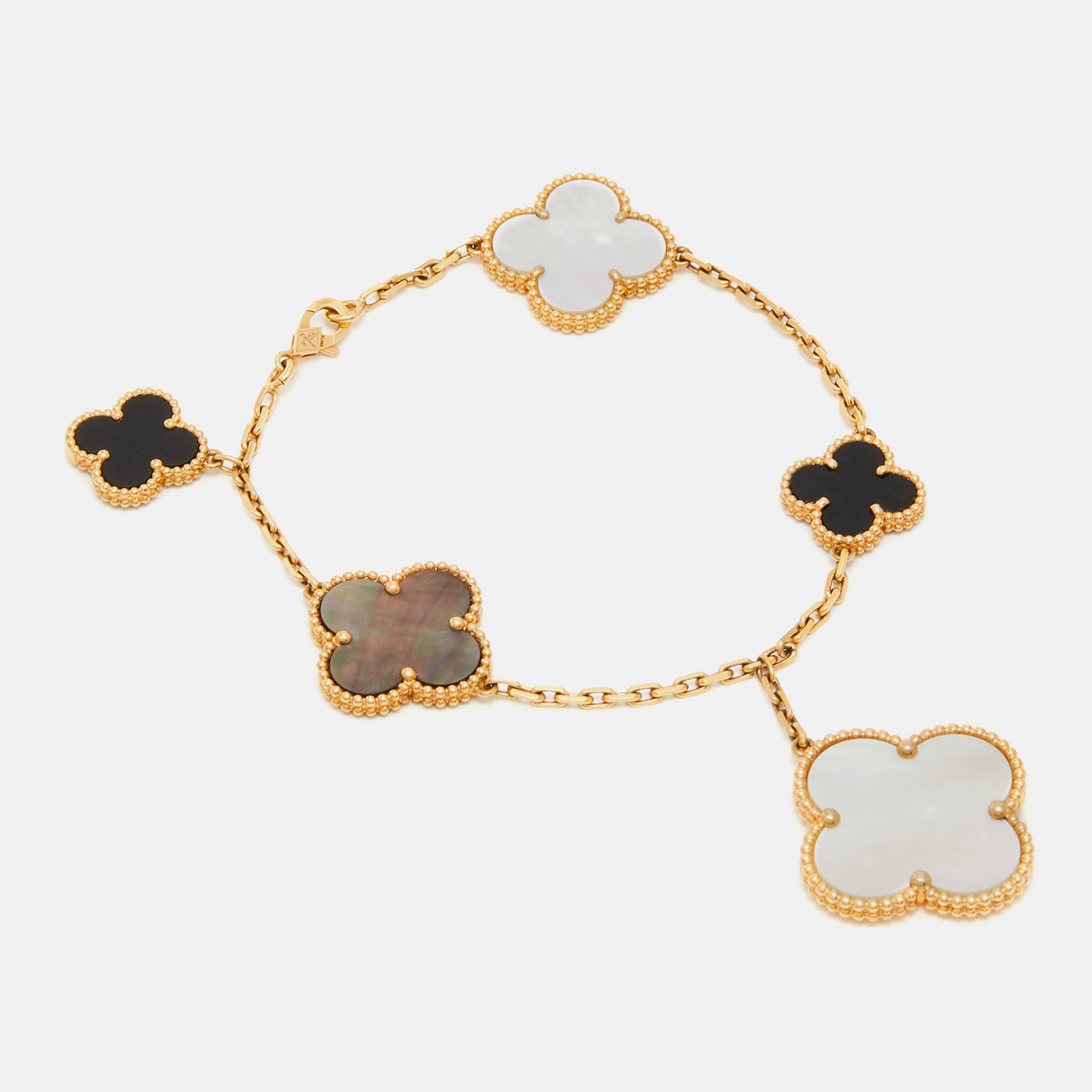 Van Cleef & Arpels Magic Alhambra Mother of Pearl Onyx 5-Motif 18k Yellow Gold Bracelet
Van Cleef & Arpels Magic Alhambra Mother of Pearl Onyx 5-Motif 18k Yellow Gold Bracelet