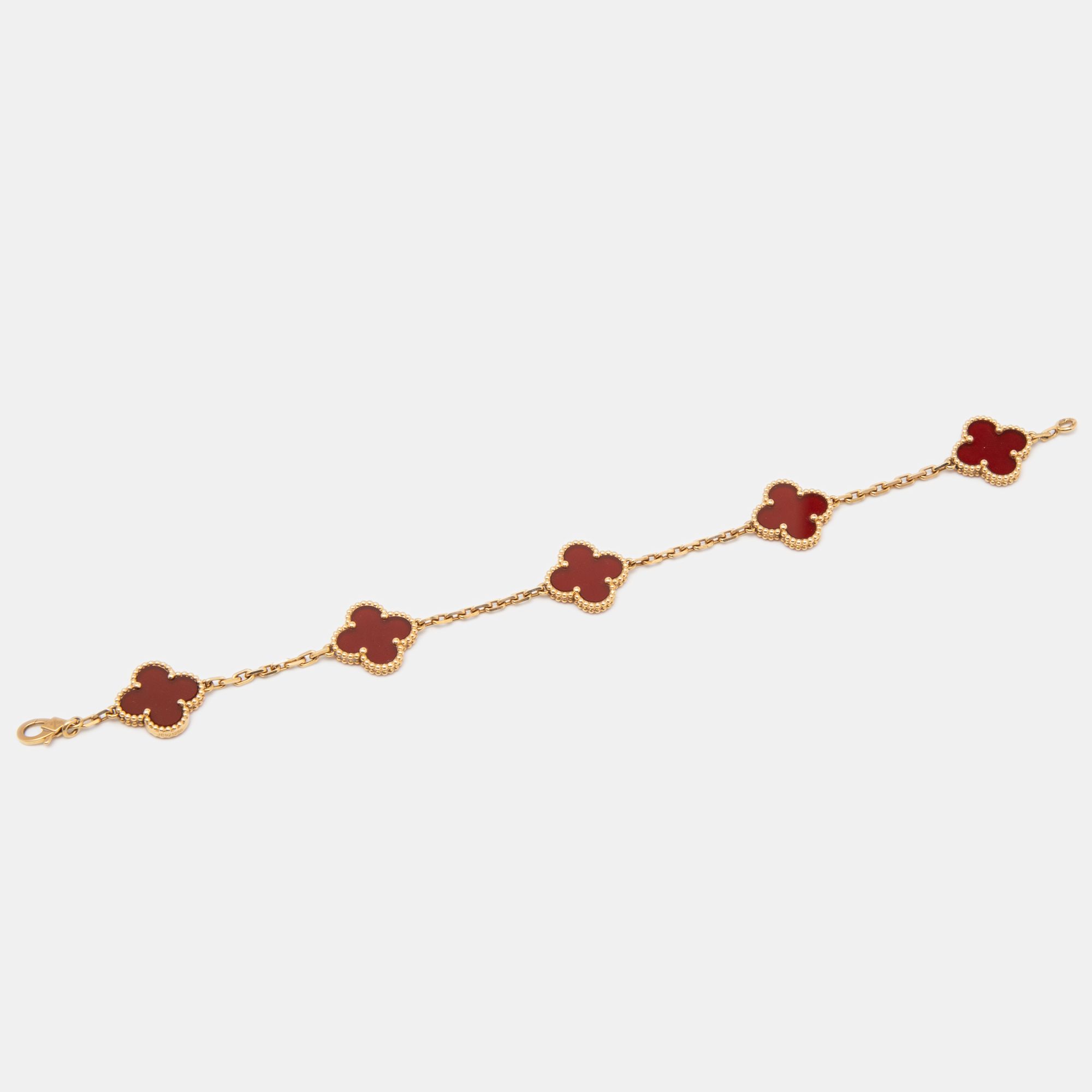 Van Cleef & Arpels Vintage Alhambra Carnelian 18k Yellow Gold 5 Motif Station Bracelet
Van Cleef & Arpels Vintage Alhambra Carnelian 18k Yellow Gold 5 Motif Station Bracelet
