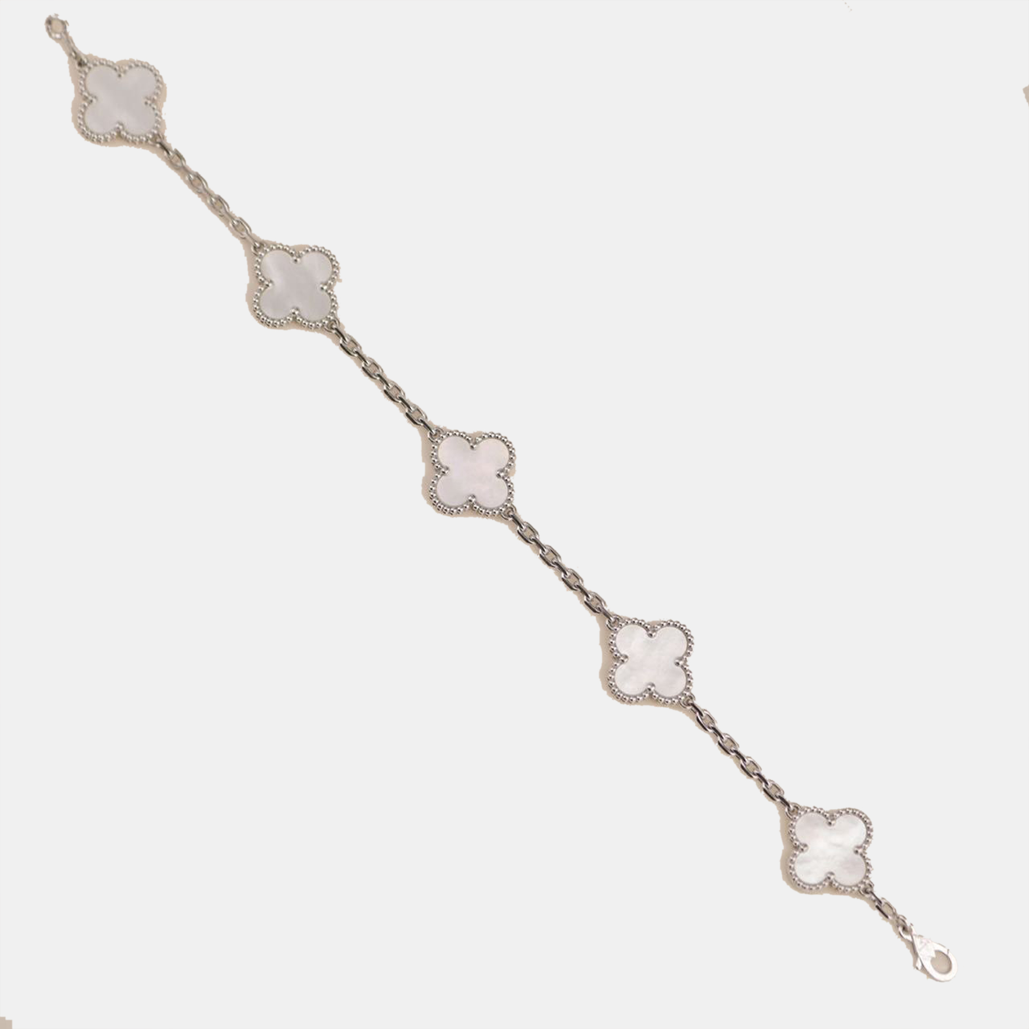 Van Cleef & Arpels 5 Motif Vintage Alhambra Mother of Pearl White Gold Bracelet
Van Cleef & Arpels 5 Motif Vintage Alhambra Mother of Pearl White Gold Bracelet