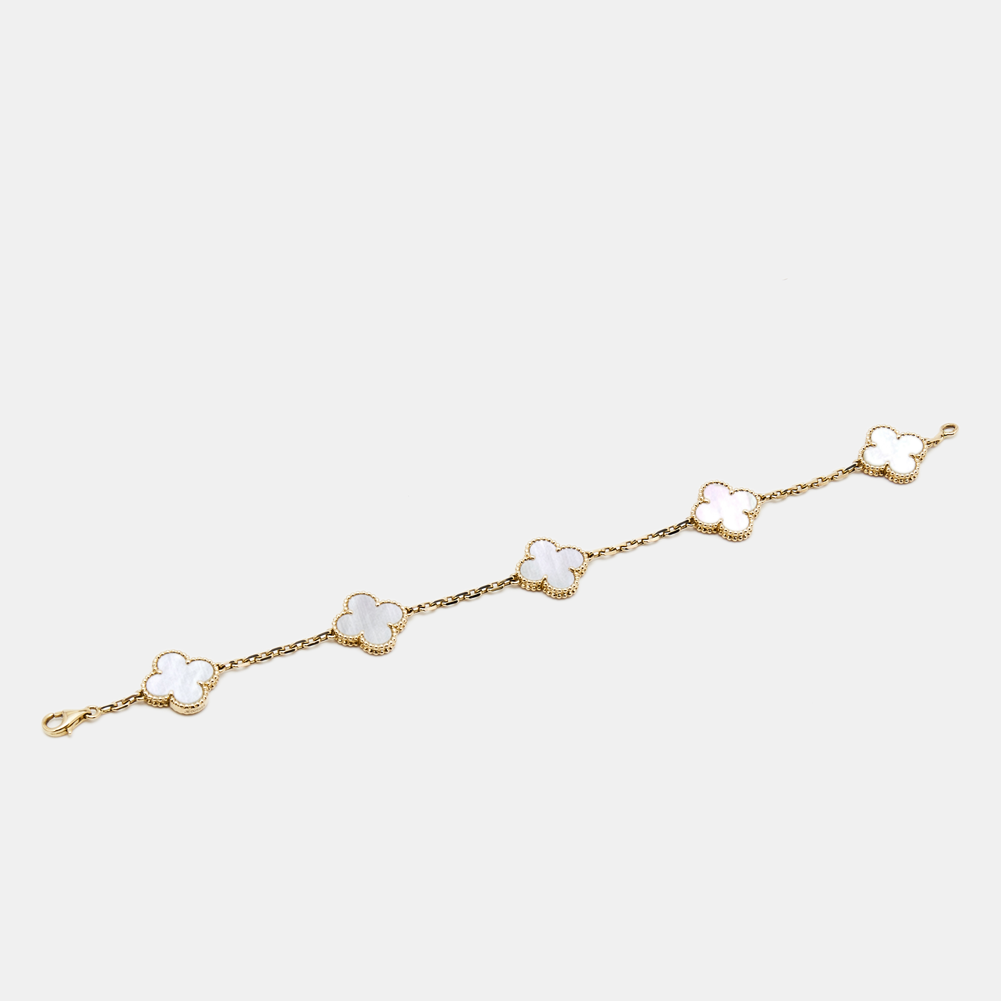 Van Cleef & Arpels Vintage Alhambra Mother of Pearl 18k Yellow Gold 5 Motif Station Bracelet
Van Cleef & Arpels Vintage Alhambra Mother of Pearl 18k Yellow Gold 5 Motif Station Bracelet