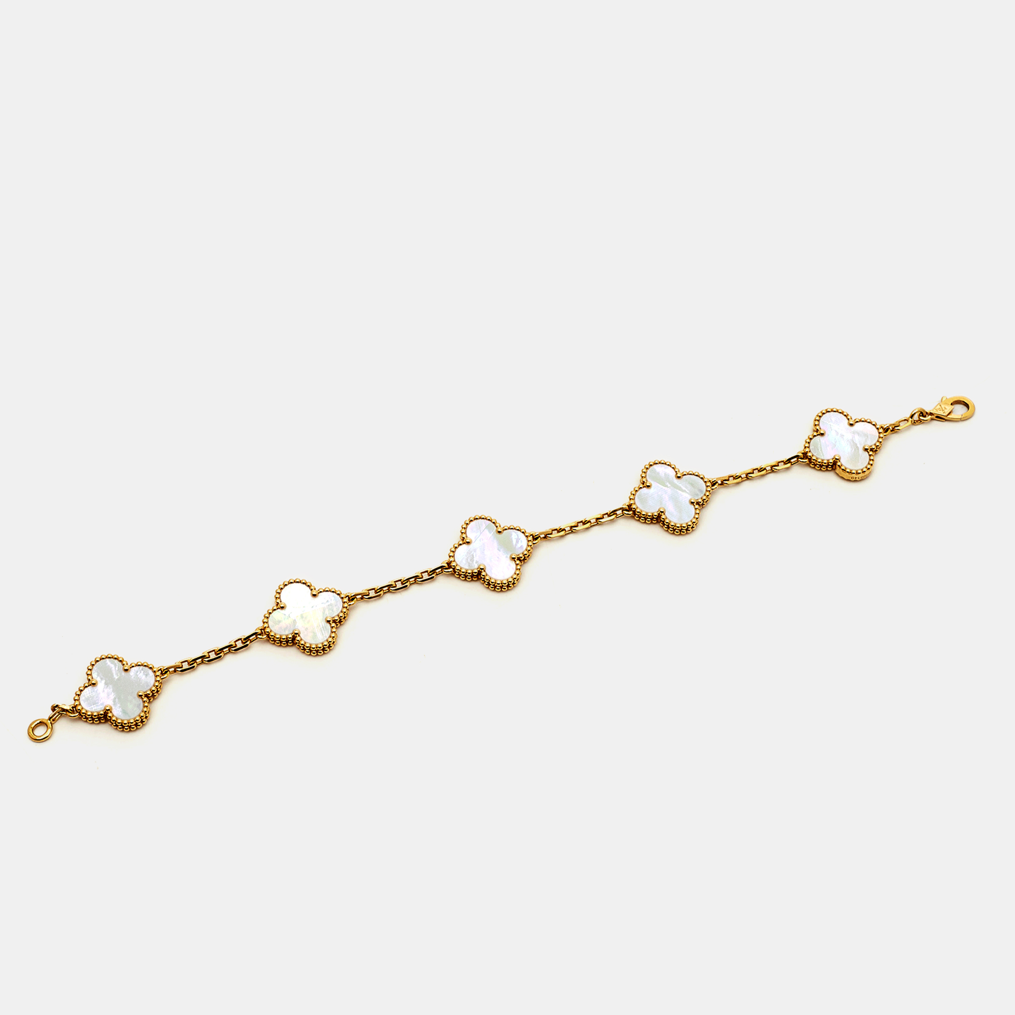 Van Cleef & Arpels Vintage Alhambra Mother of Pearl 18k Yellow Gold 5 Motif Station Bracelet
Van Cleef & Arpels Vintage Alhambra Mother of Pearl 18k Yellow Gold 5 Motif Station Bracelet