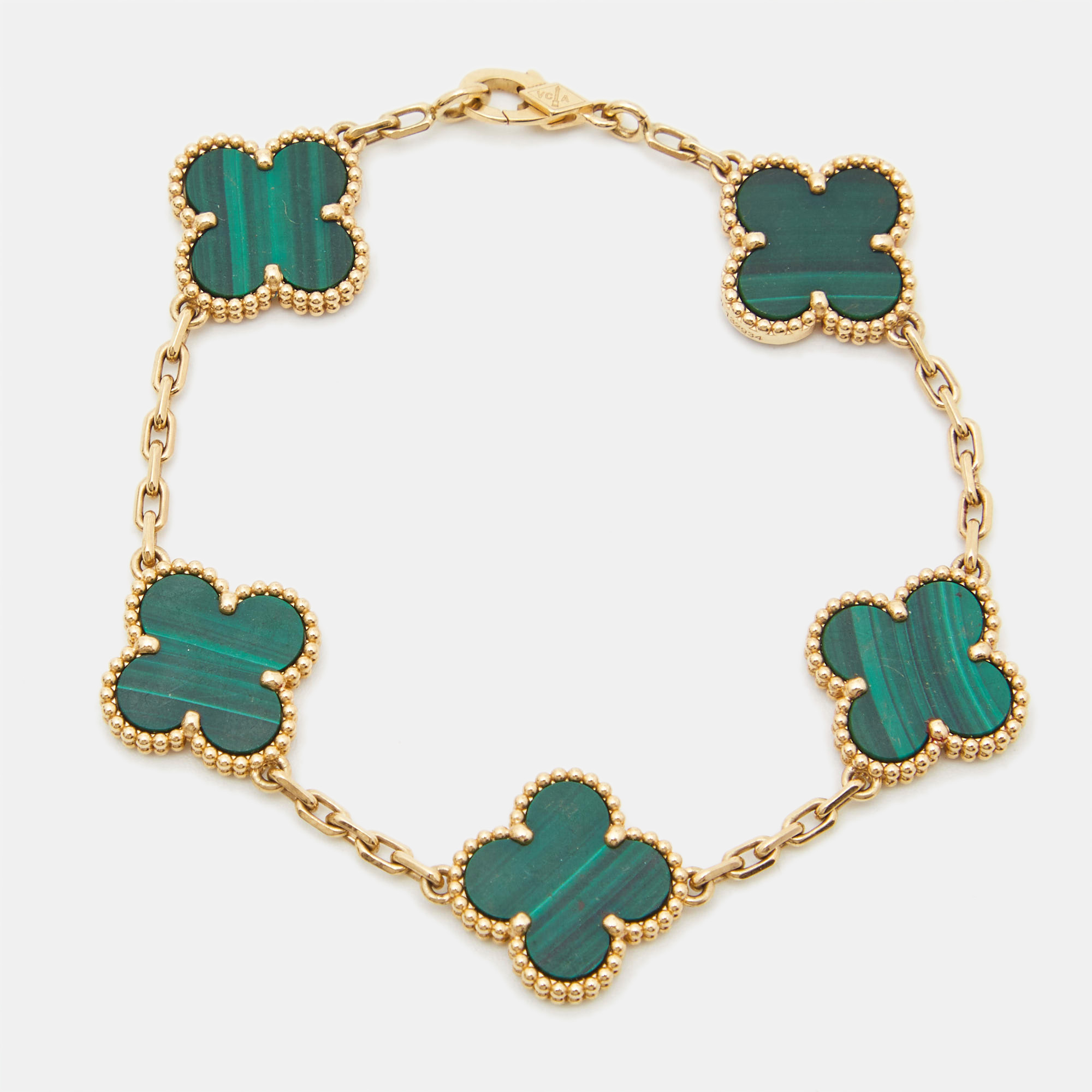 Van Cleef & Arpels Vintage Alhambra Malachite 5 Motif 18k Yellow Gold Bracelet
Van Cleef & Arpels Vintage Alhambra Malachite 5 Motif 18k Yellow Gold Bracelet