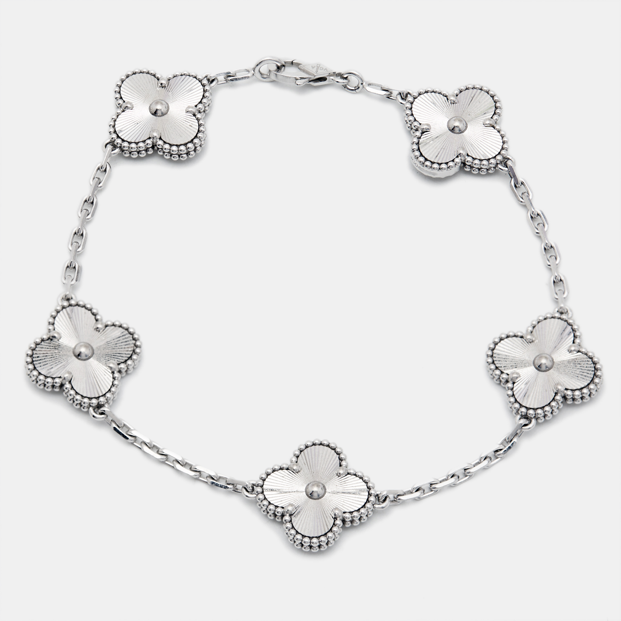 Van Cleef & Arpels Vintage Alhambra Guilloché 18k White Gold Bracelet
Van Cleef & Arpels Vintage Alhambra Guilloché 18k White Gold Bracelet