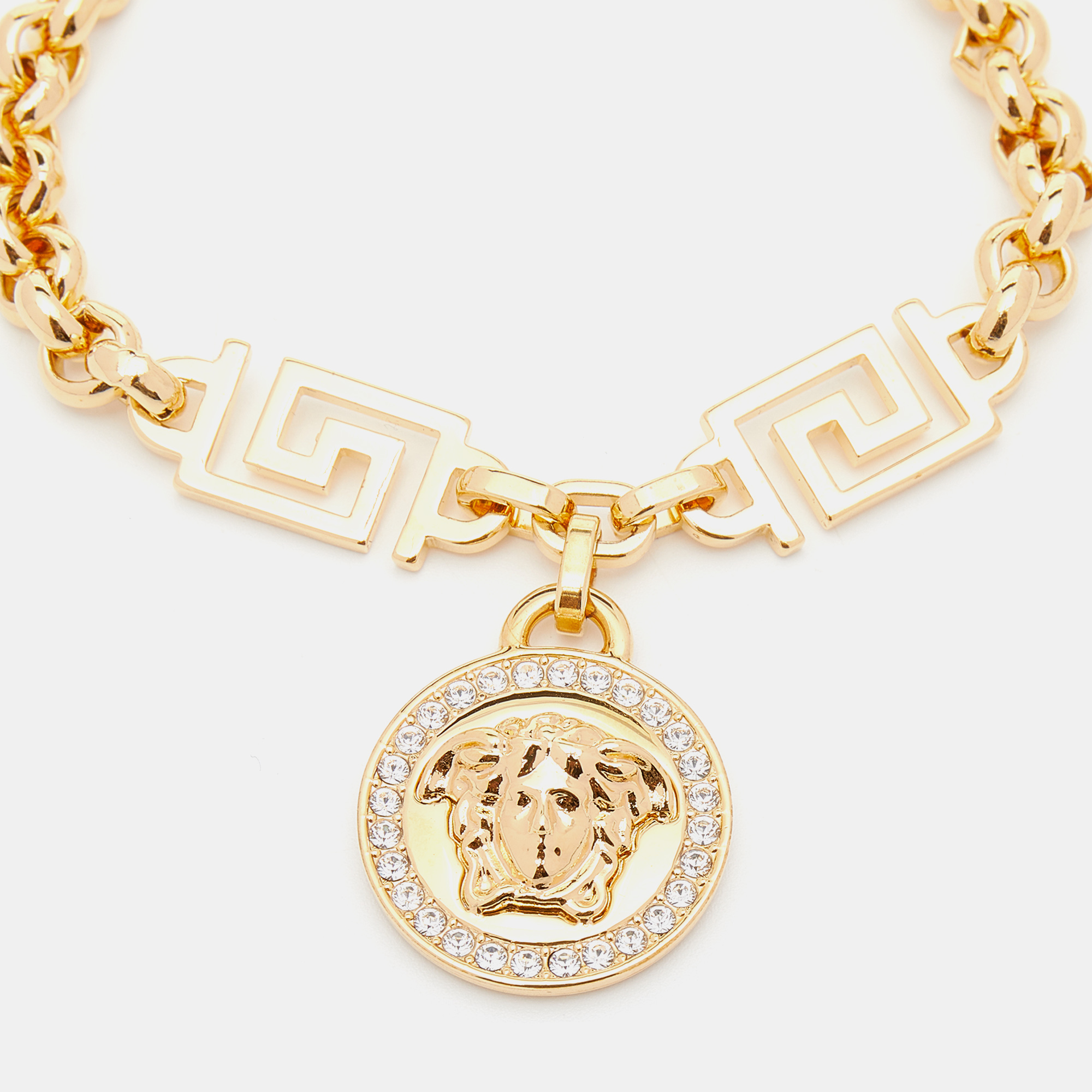 

Versace Gold Tone Greca Crystal Embellished Icon Medusa Bracelet
