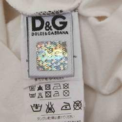 مملوكة مسبقًا ``` 
تي شيرت دولتشي أند غابانا جونيور أبيض بطبعة مفلوقة جيرسي 2-3 سنوات
```