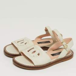 Pre Owned صنادل مسطحة جلد أبيض بشعار DG ورباط للكاحل دولتشي أند غابانا مقاس 31