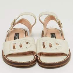 Pre Owned صنادل مسطحة جلد أبيض بشعار DG ورباط للكاحل دولتشي أند غابانا مقاس 31