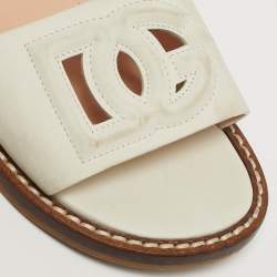 Pre Owned صنادل مسطحة جلد أبيض بشعار DG ورباط للكاحل دولتشي أند غابانا مقاس 31