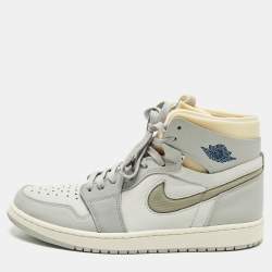 مملوكة مسبقًا حذاء رياضي اير جوردان 1 جلد رمادي وشبكة بعنق مرتفع مقاس 46