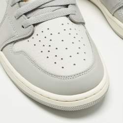 مملوكة مسبقًا حذاء رياضي اير جوردان 1 جلد رمادي وشبكة بعنق مرتفع مقاس 46