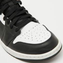 Air Jordans Black/White Leather Jordan 1 Mid Sneakers Size 46