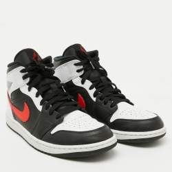 Air Jordans Black/White Leather Jordan 1 Mid Sneakers Size 46