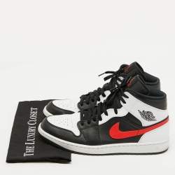 Air Jordans Black/White Leather Jordan 1 Mid Sneakers Size 46