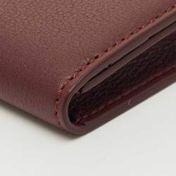 مملوكة مسبقًا حامل بطاقات الأعمال كارتير موست دي كارتير جلد عنابي