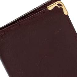 مملوكة مسبقًا حافظة بطاقات كارتييه ماست دو كارتييه جلد عنابي