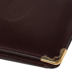 Pre Owned Cartier Maroon Leather Must De Cartier 6CC Bifold Wallet